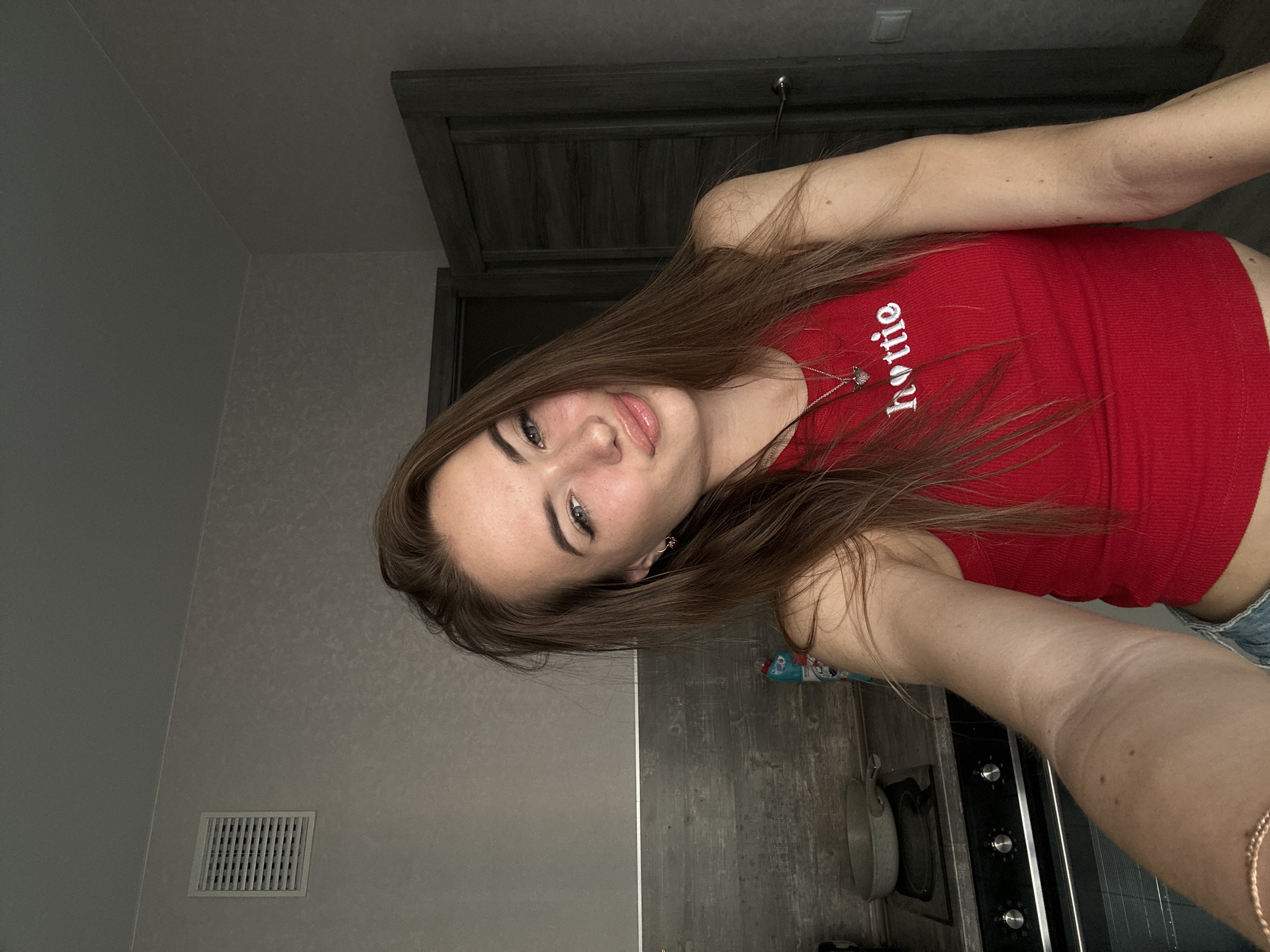 Kitchen selfie session with multiple poses and expressions