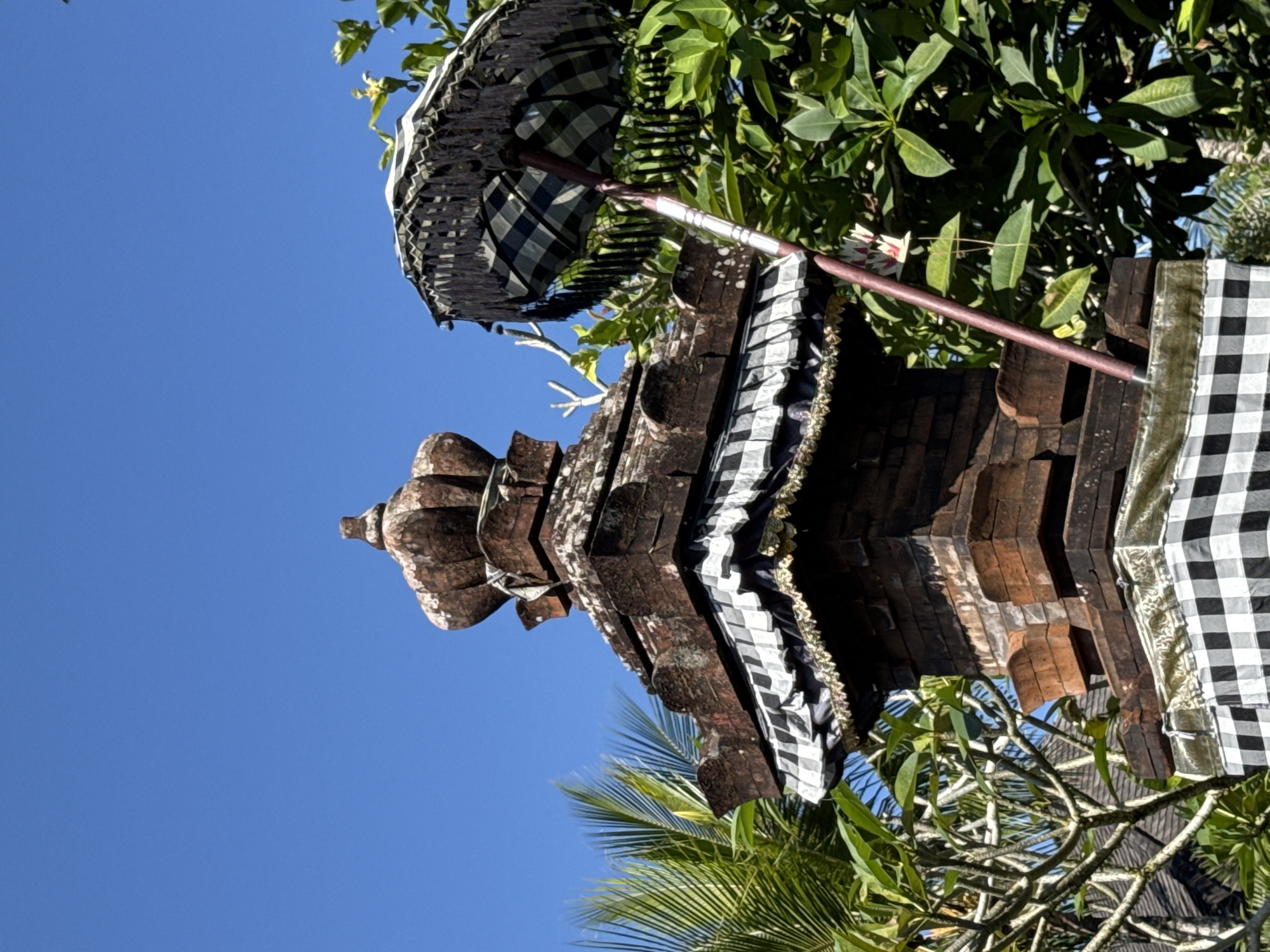Balinese temple statues, shrines, and offerings in Ubud