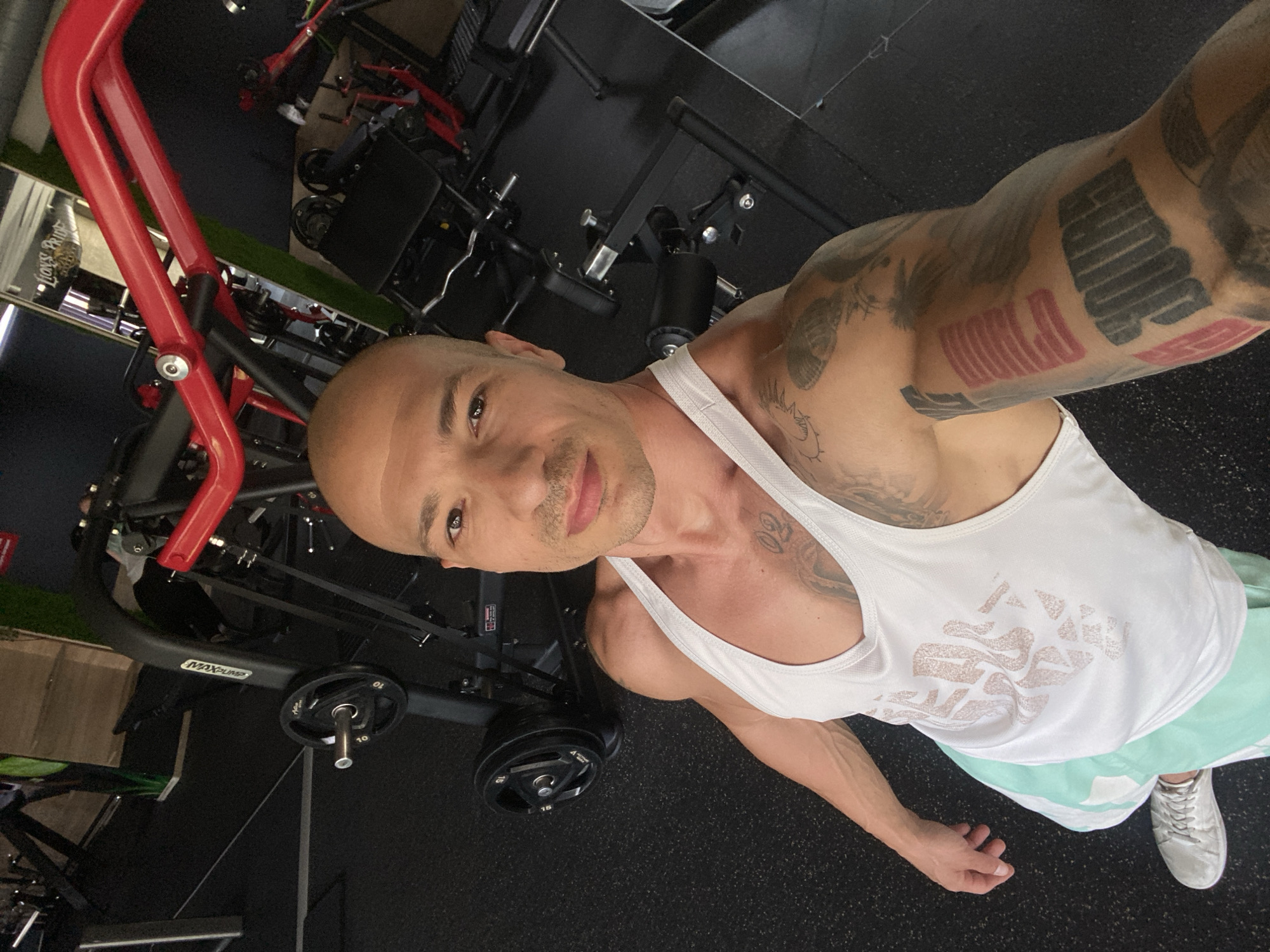 Gym session with tattoo-forward poses in Pleven, Bulgaria