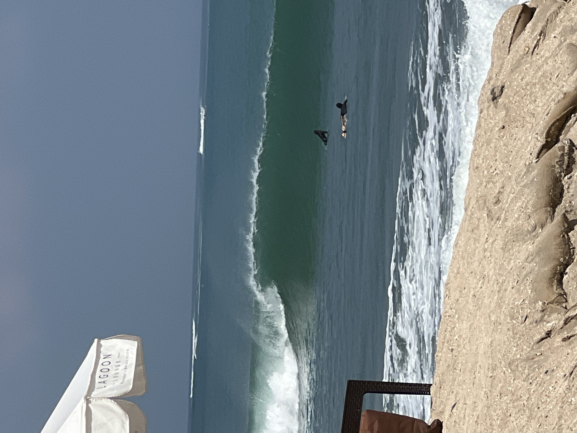 Busy morning at Kuta Beach: surf, sand, and shoreline life