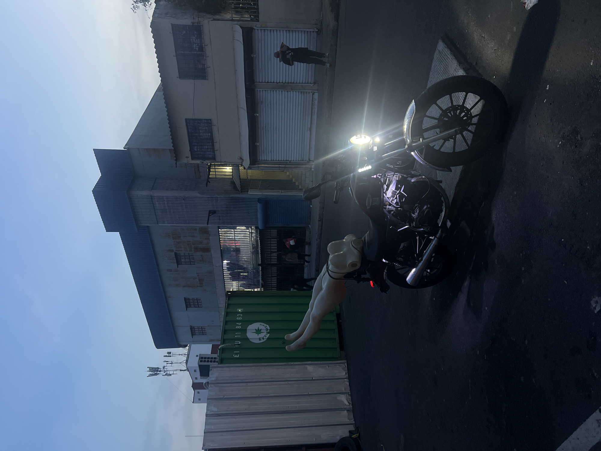 Nighttime scenes documented across San Salvador including cathedral, motorcycle