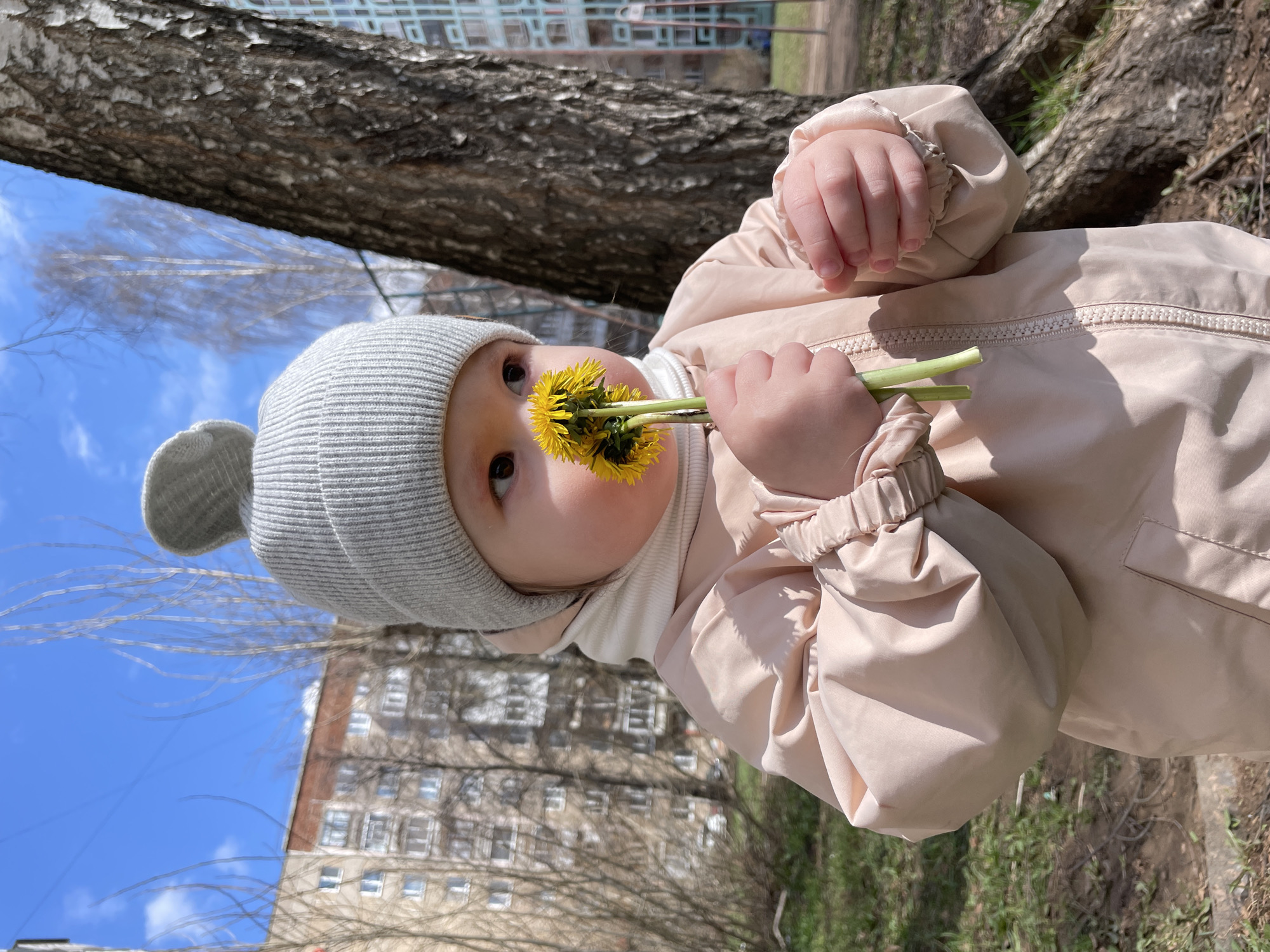 Mother, baby enjoy spring morning at Izhevsk playground