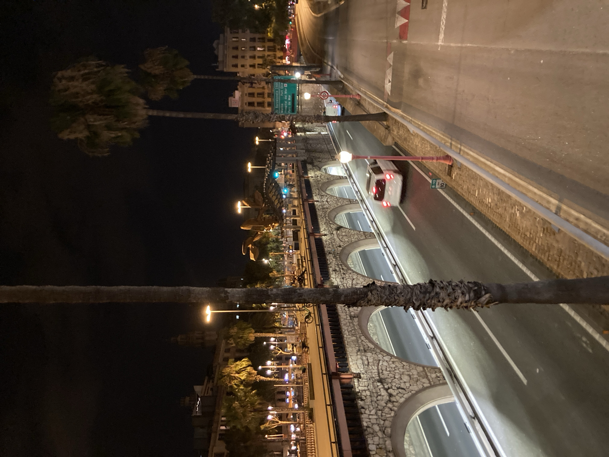 A summer night out along Barcelona's Port Olímpic waterfront.