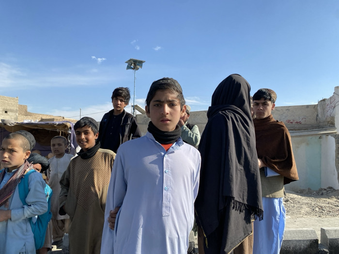 Afghan village witnesses road paving project with heavy machinery