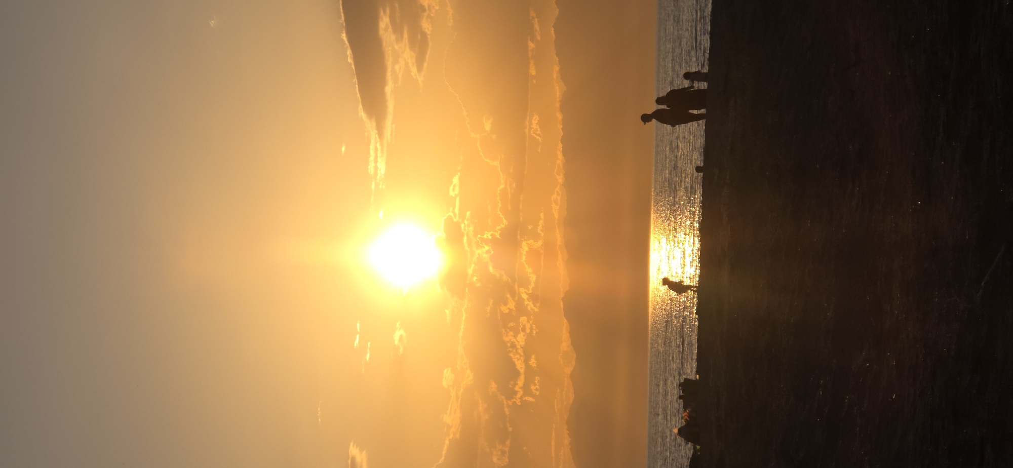 Sunset over Issyk-Kul lake shore, Boz Beshik, Kyrgyzstan