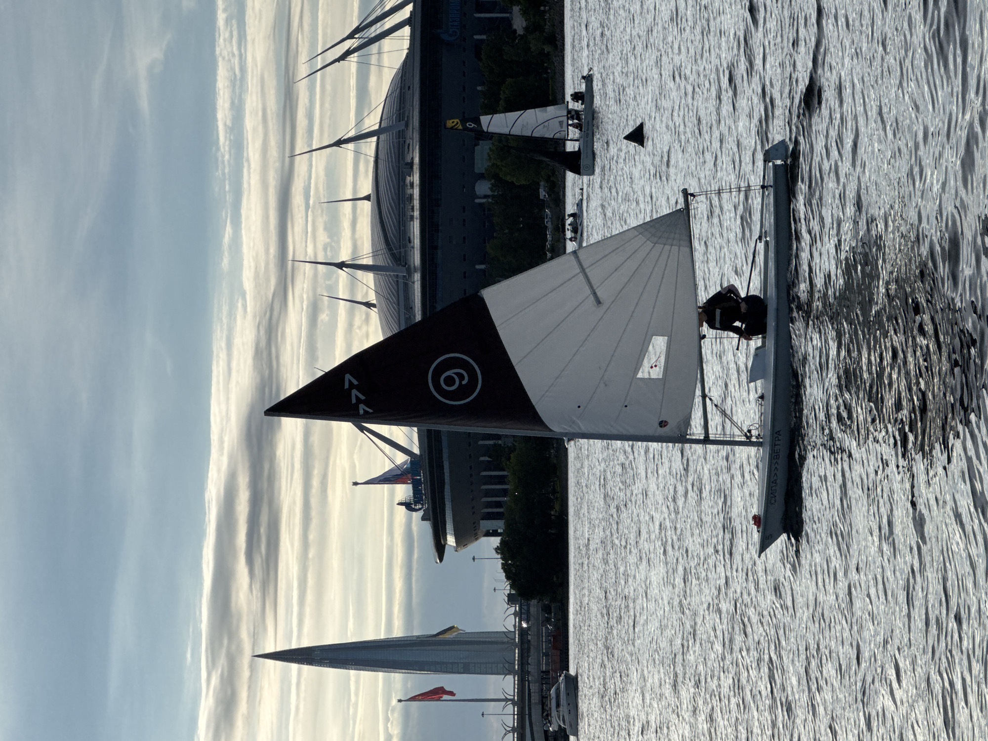 Regatta on the Neva with the WHSD bridge at sunset
