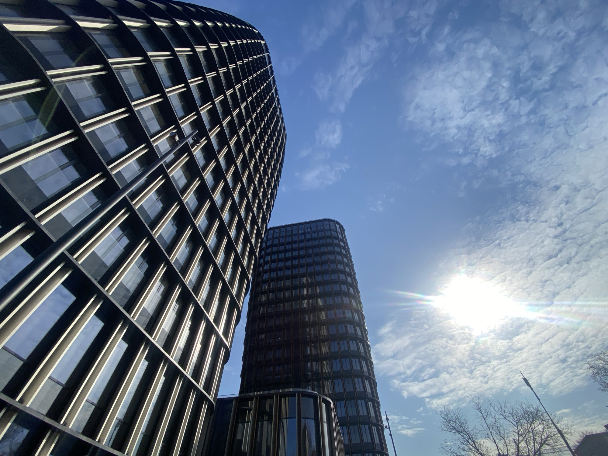 Modern high-rises photographed against blue sky in Moscow