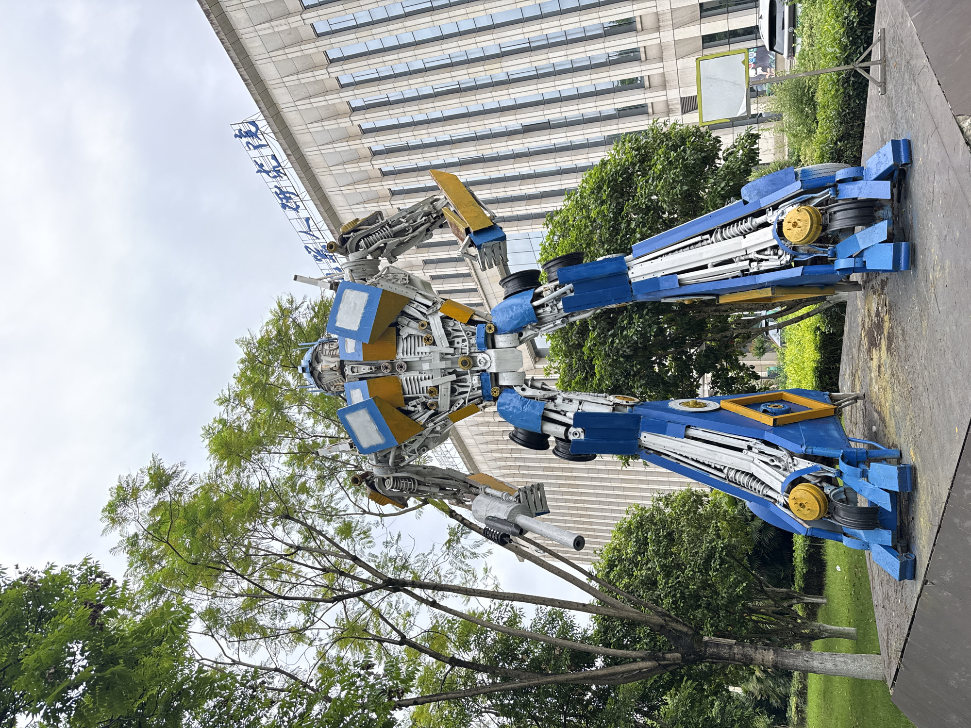 Metal robot sculpture spotted outside modern building in China