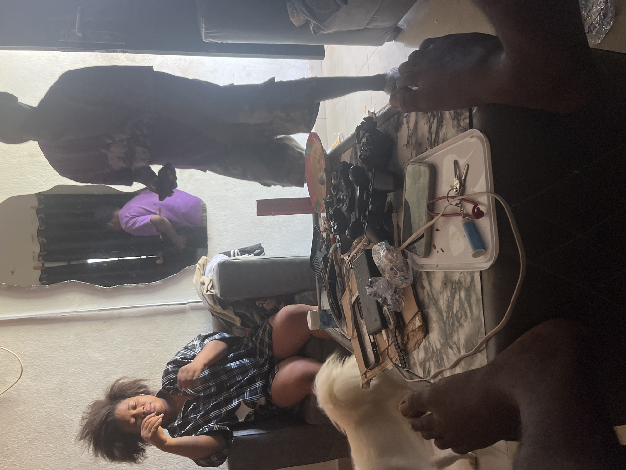 Casual indoor gathering documented in Ikot Ekpene, Nigeria