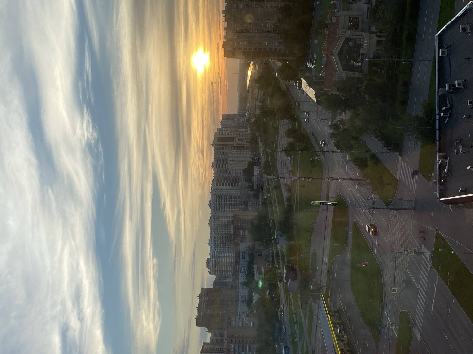 City skyline and park at golden hour, two angles