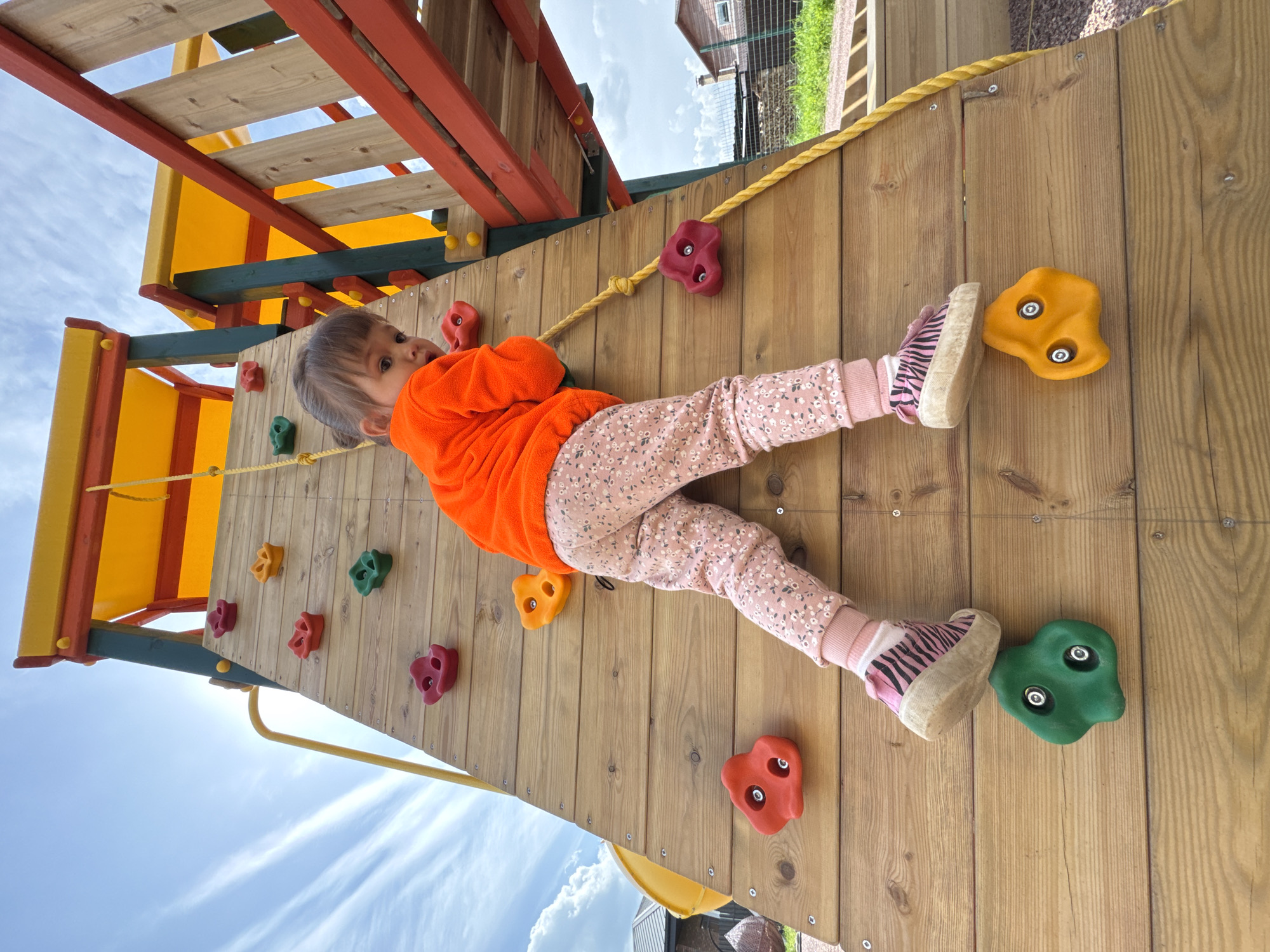 Morning playground visit at a Russian park, climbing and swinging.