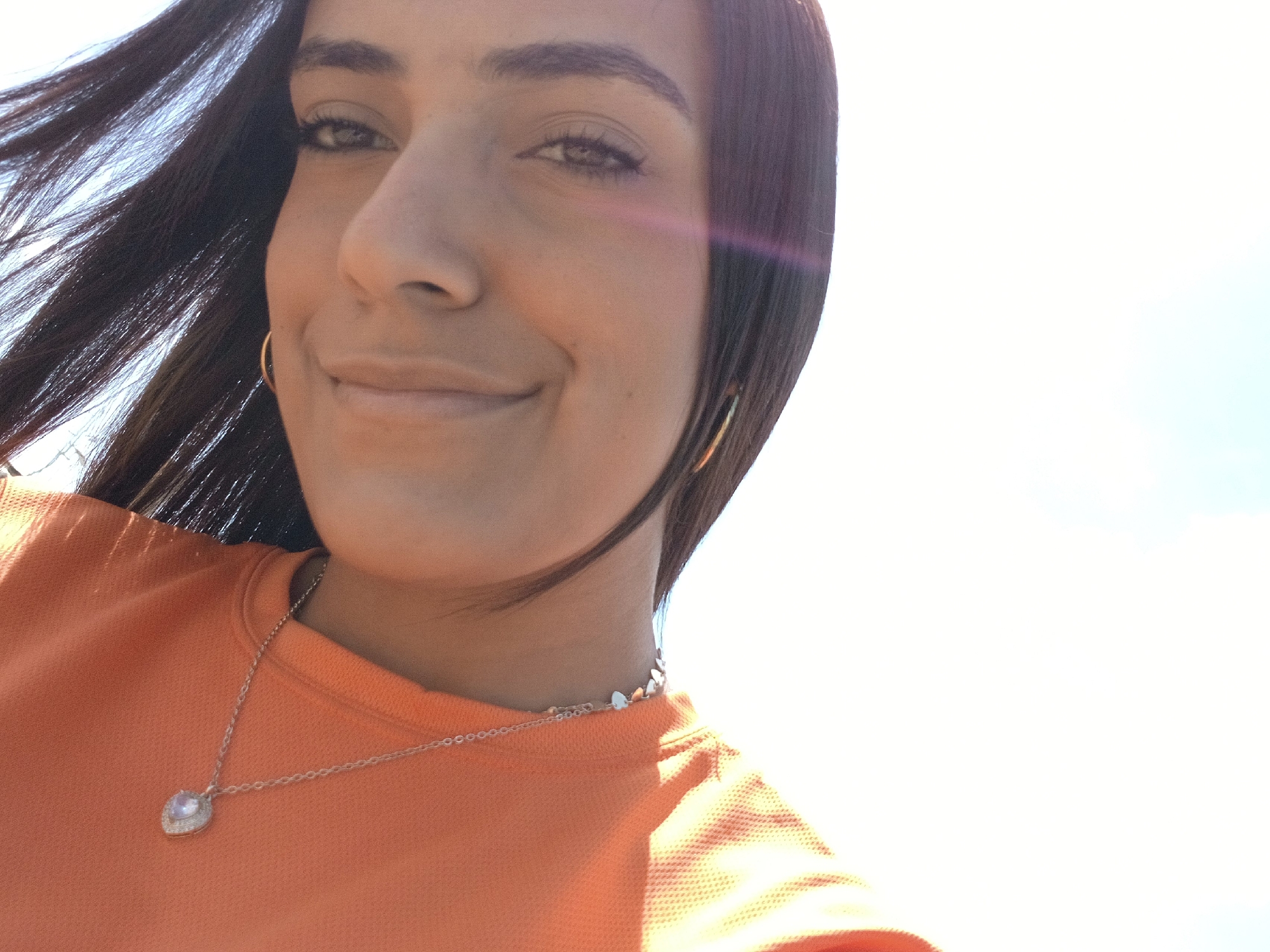 Woman takes outdoor selfies in Altagracia, Venezuela