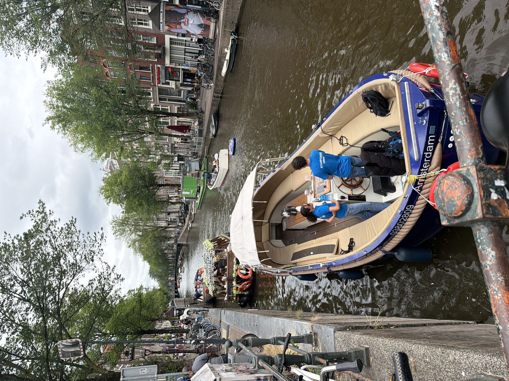 Midday stroll through Amsterdam's canals and brick streets