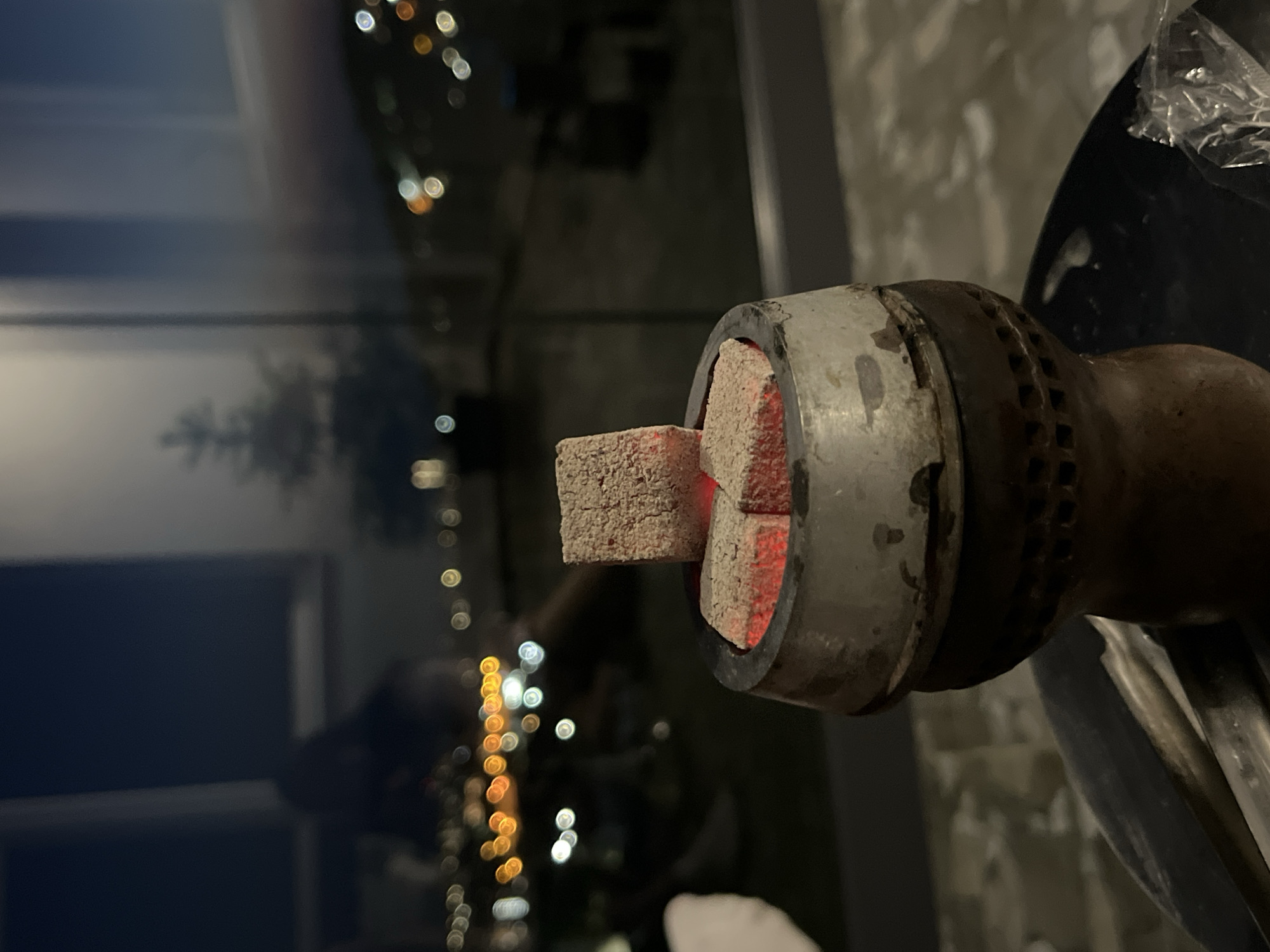 Evening hookah session captured on Baranovka balcony overlooking city