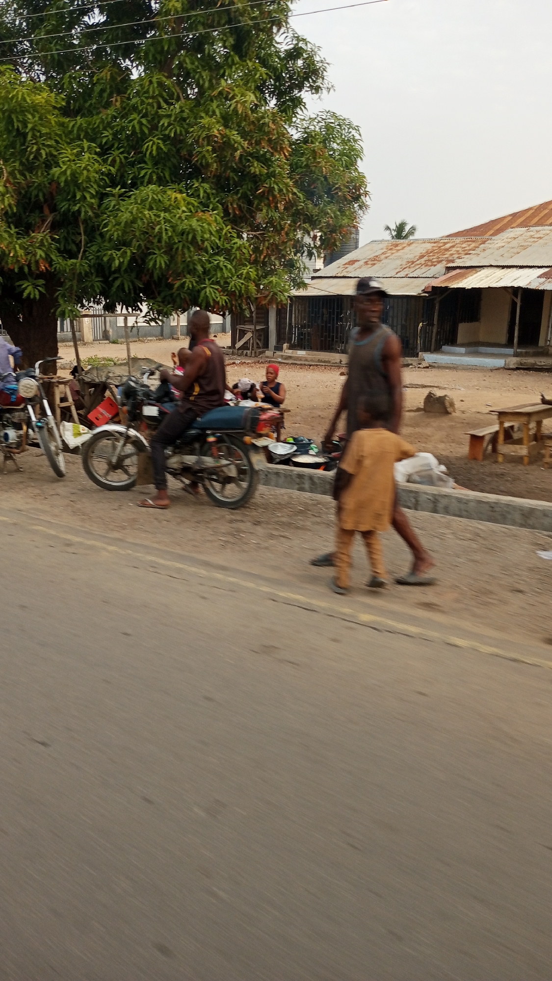 Morning street life documented across two Nigerian communities