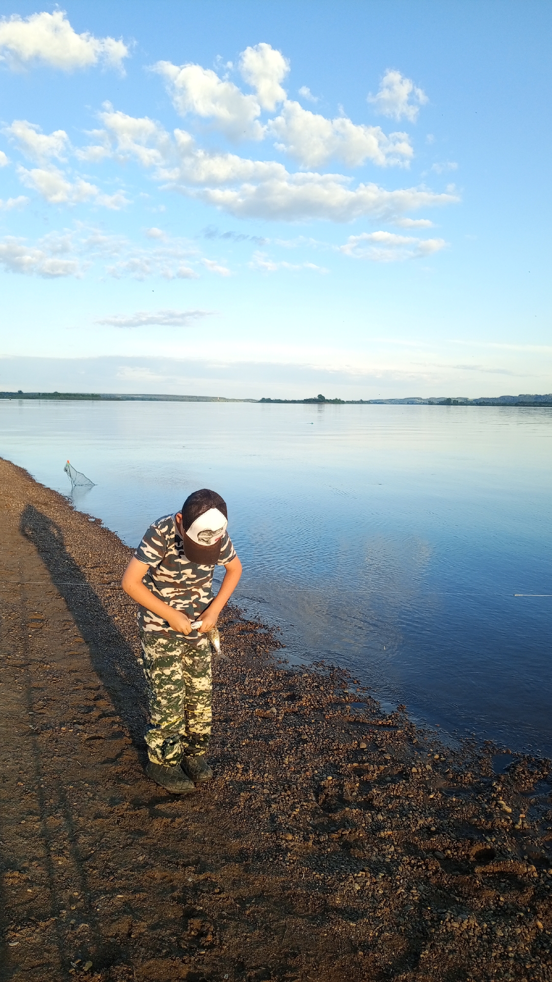 Riverside sunset moments captured along Kama River in Russia