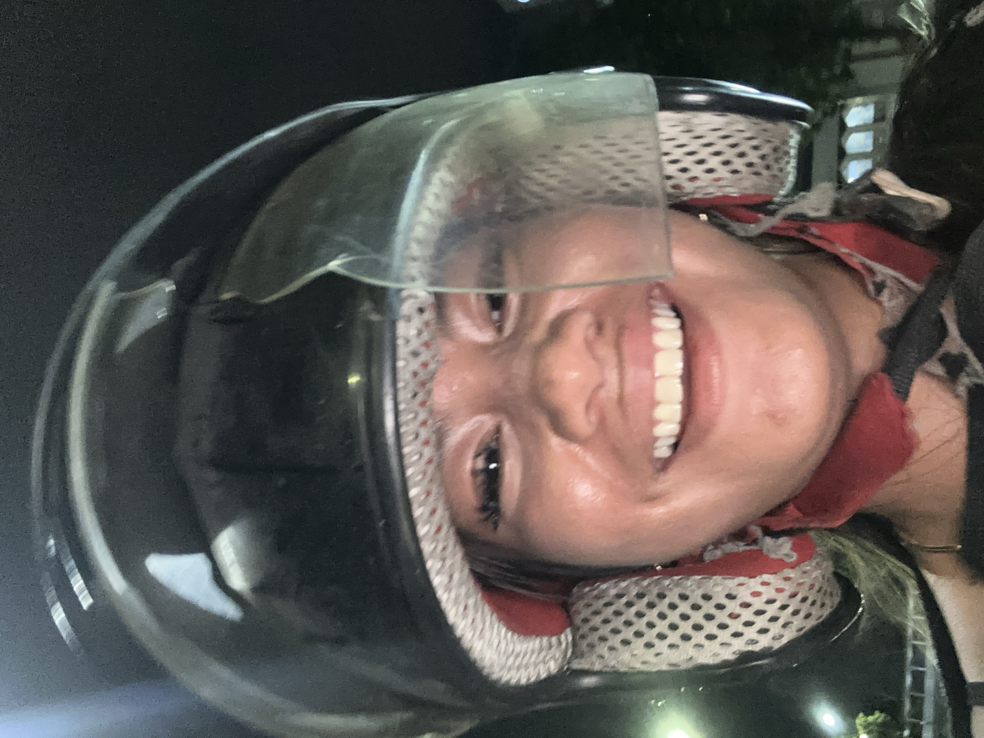 Smiling motorcyclist spotted in Central Jakarta