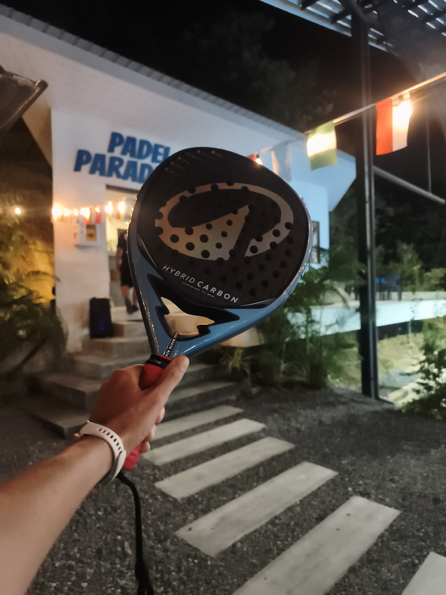 Night padel session on a floodlit court in Ko Samui