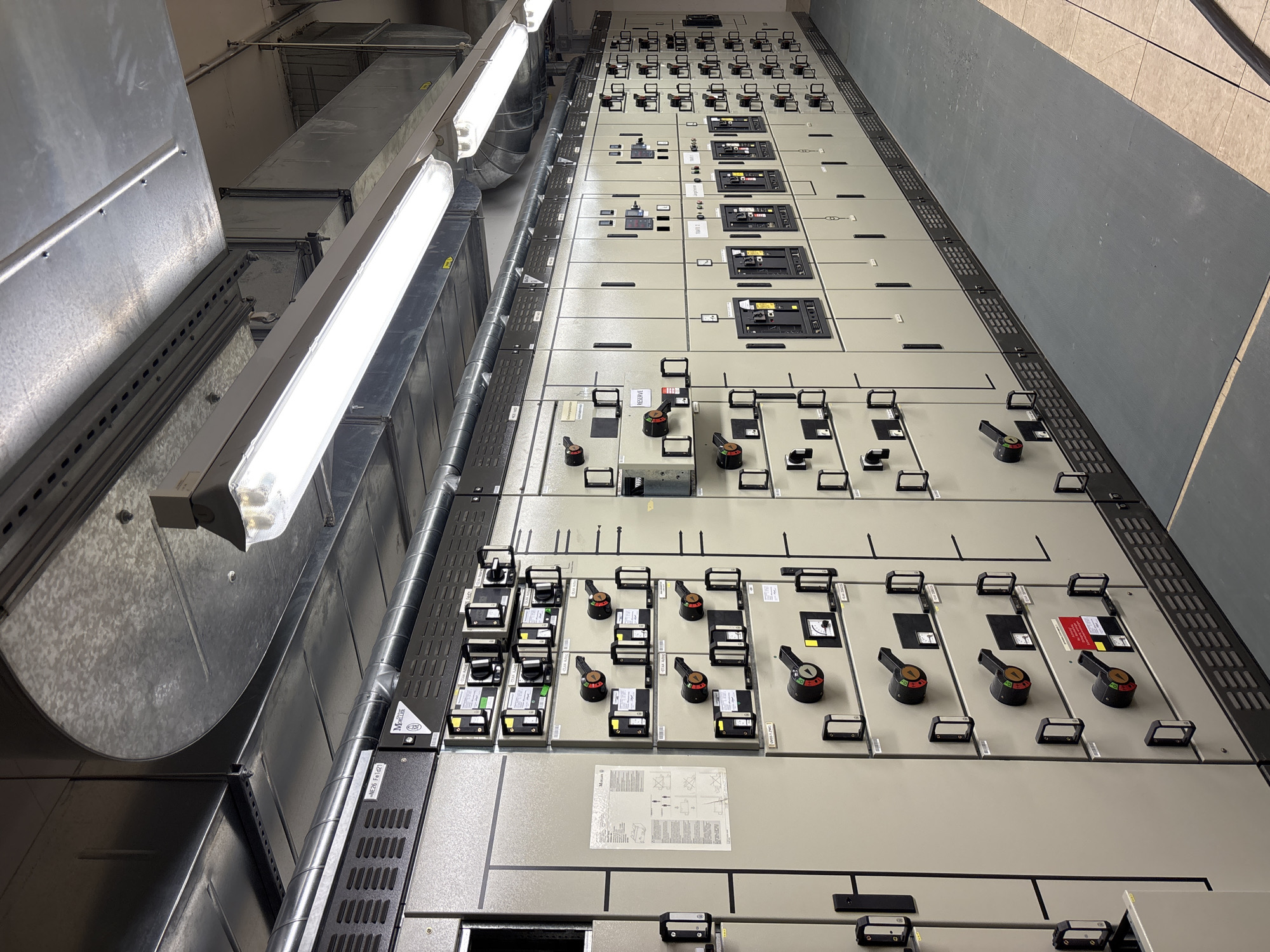 Inside a Mannheim electrical substation, panels and cable runs throughout