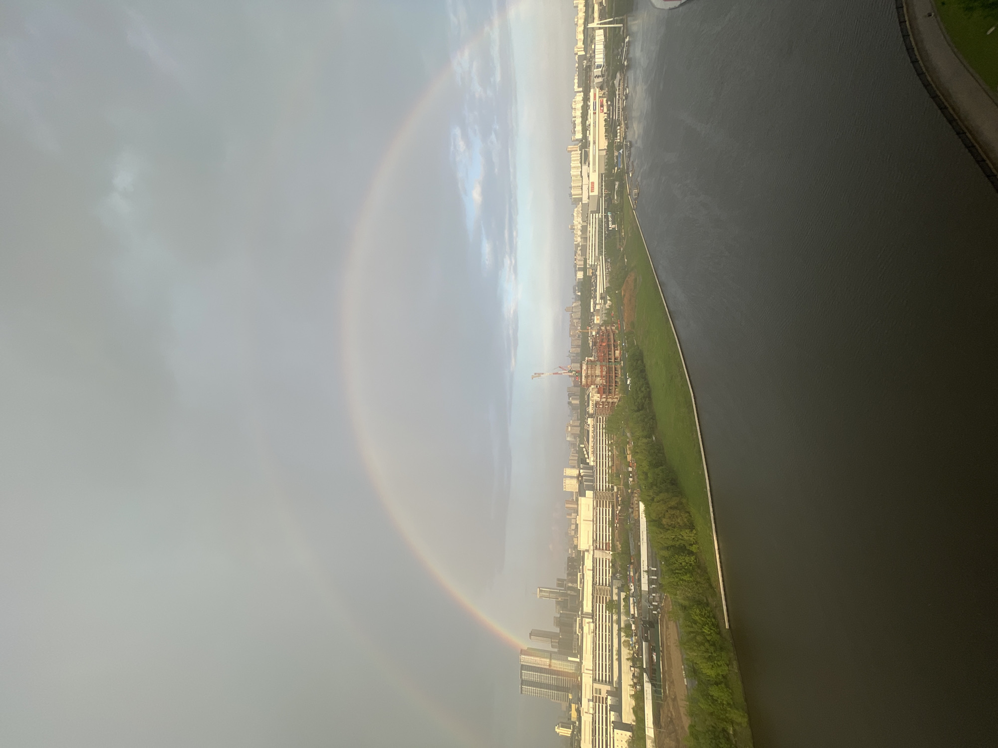 Double rainbow appears over Khimki, Russia cityscape