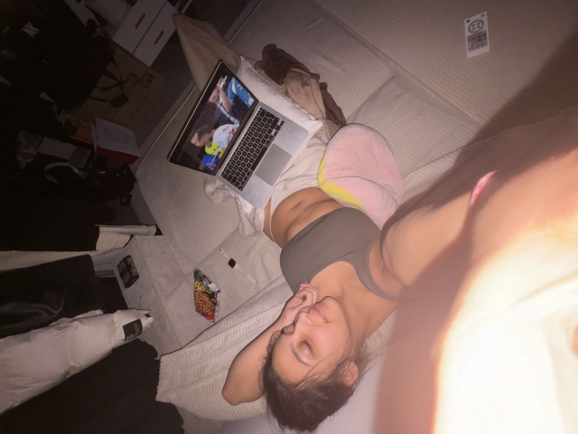 Casual evening at home, browsing on a laptop