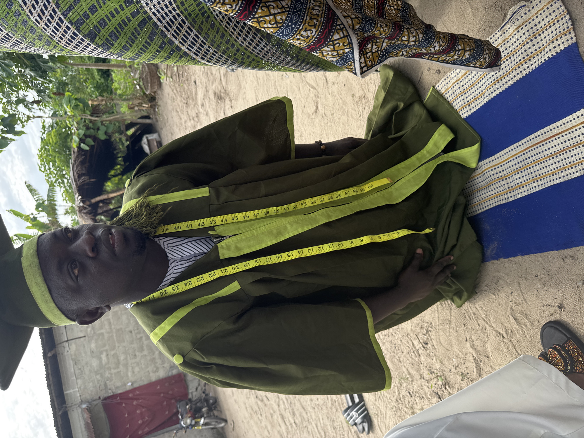 Traditional tailoring and pottery examination documented in Tofa, Nigeria