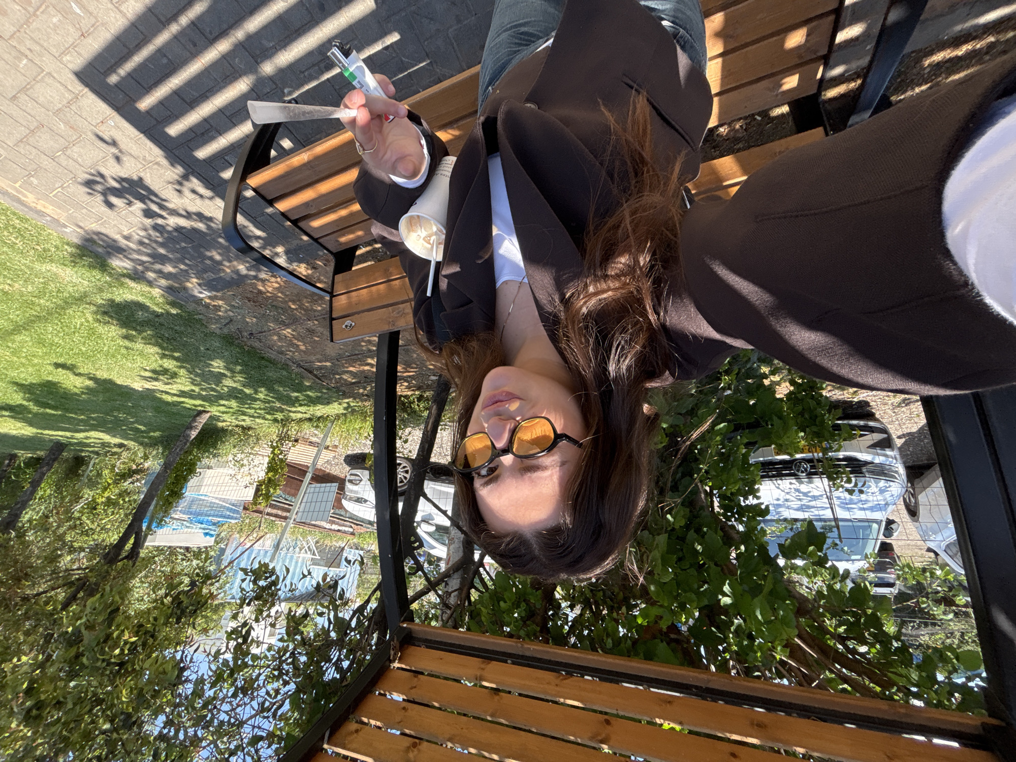 Woman spotted relaxing on bench in Ramat HaSharon