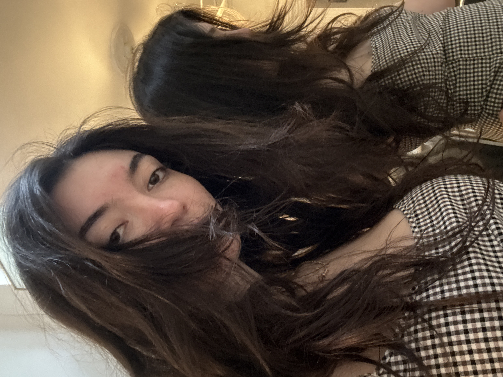 Woman takes selfies in NYC apartment Thursday evening