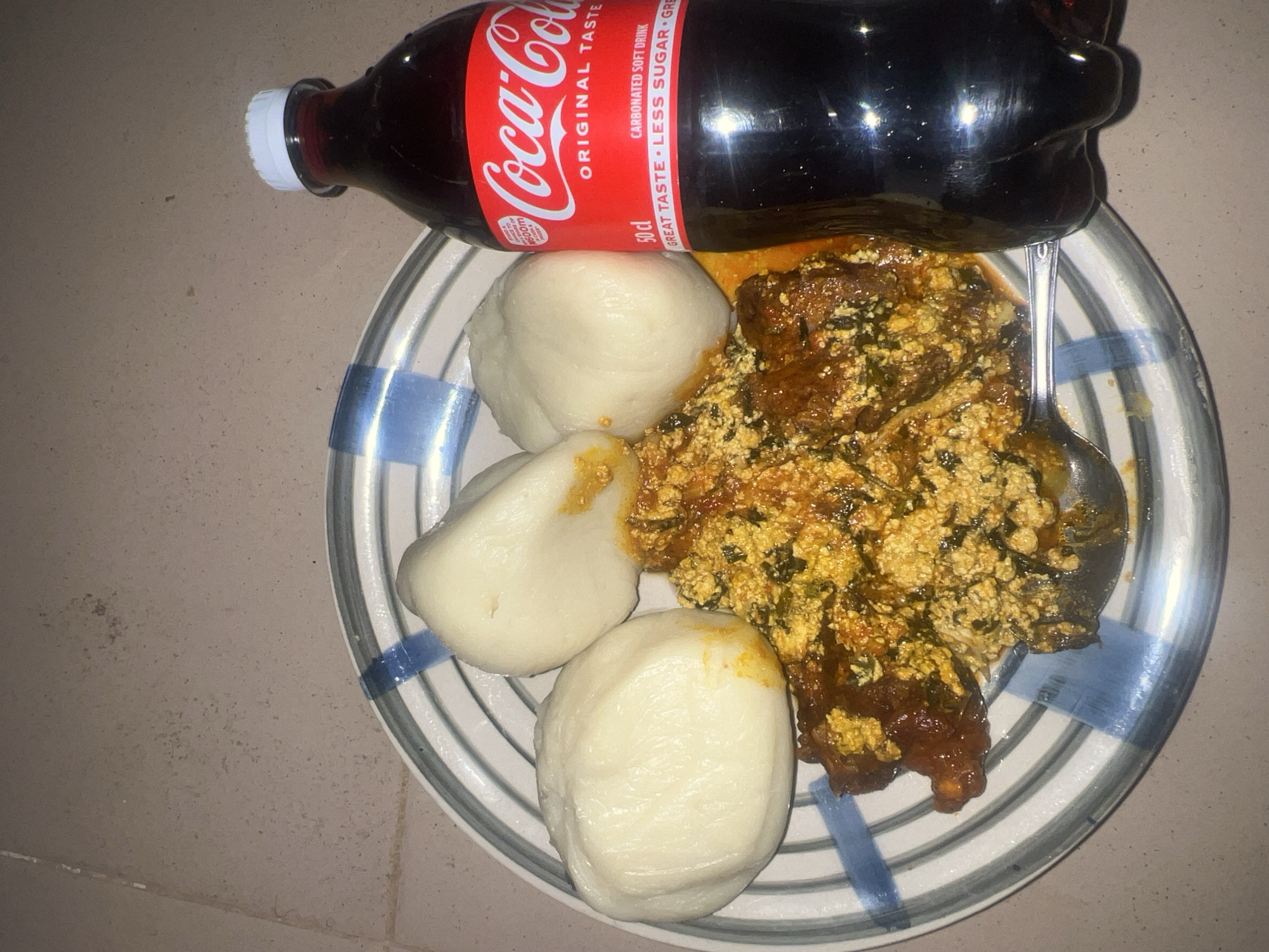 Nigerian meal and car inspection captured in Jos-Gwong area