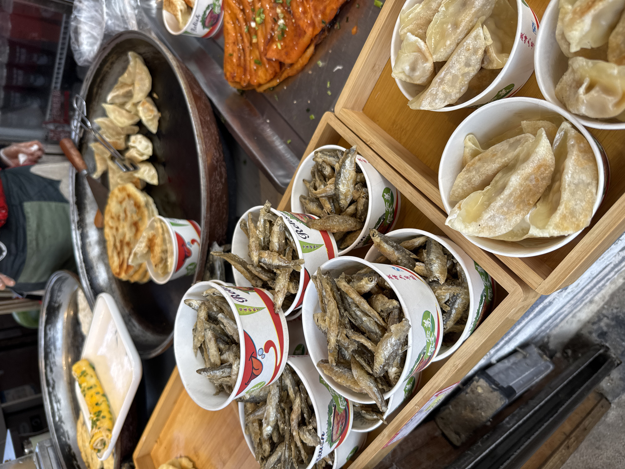 Tourists explore Zhangjiajie National Park, take selfies, sample street food