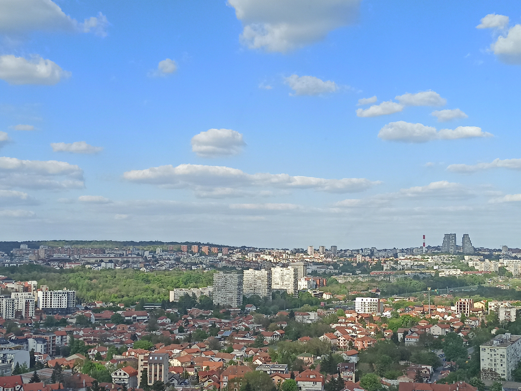 Panoramic cityscape view documented in Belgrade suburb under clear skies