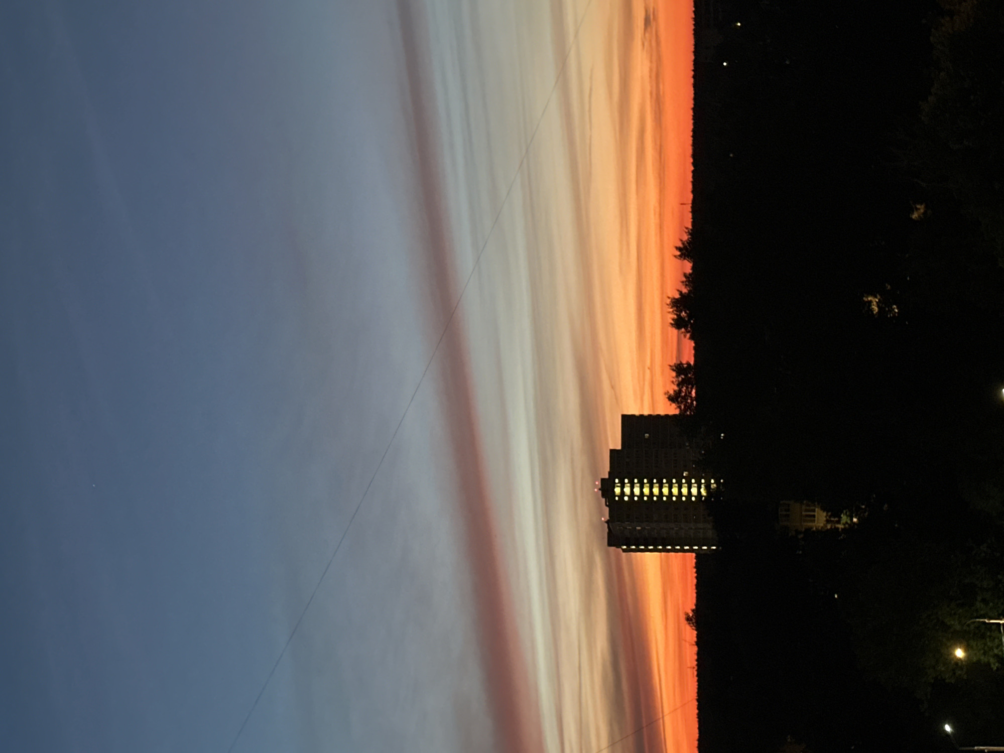 City sunset watched from multiple windows and angles