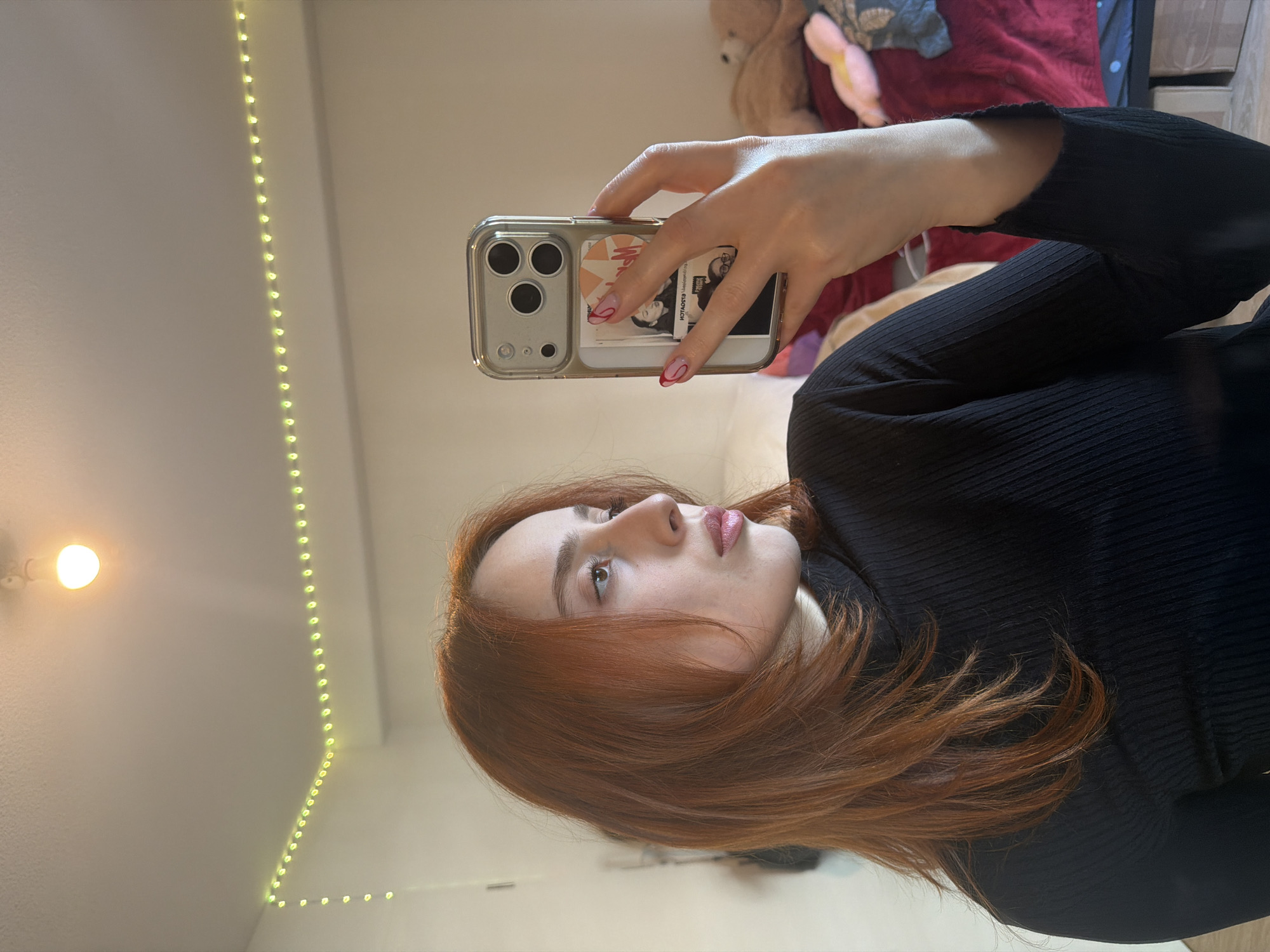 Woman documents outfit changes through mirror selfies in Strasbourg