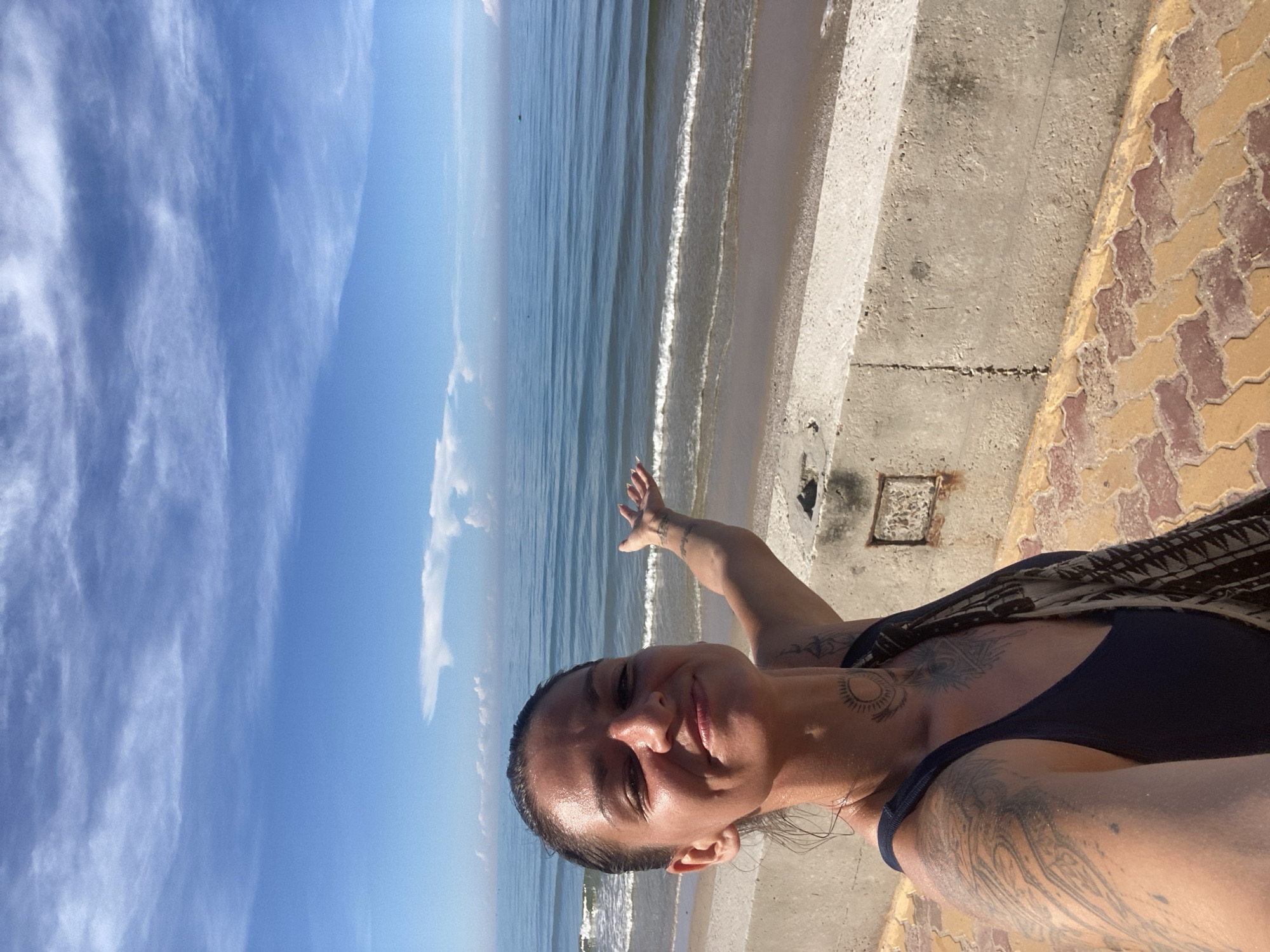 Dog walk and selfies along the Mũi Né seafront promenade