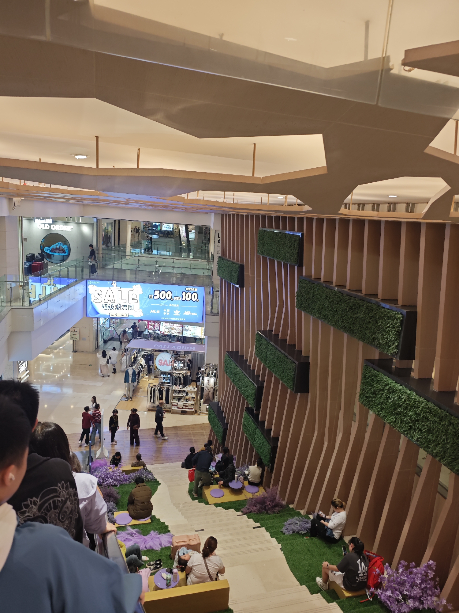 Morning shoppers browse modern mall in Chongqing's Yuzhong District