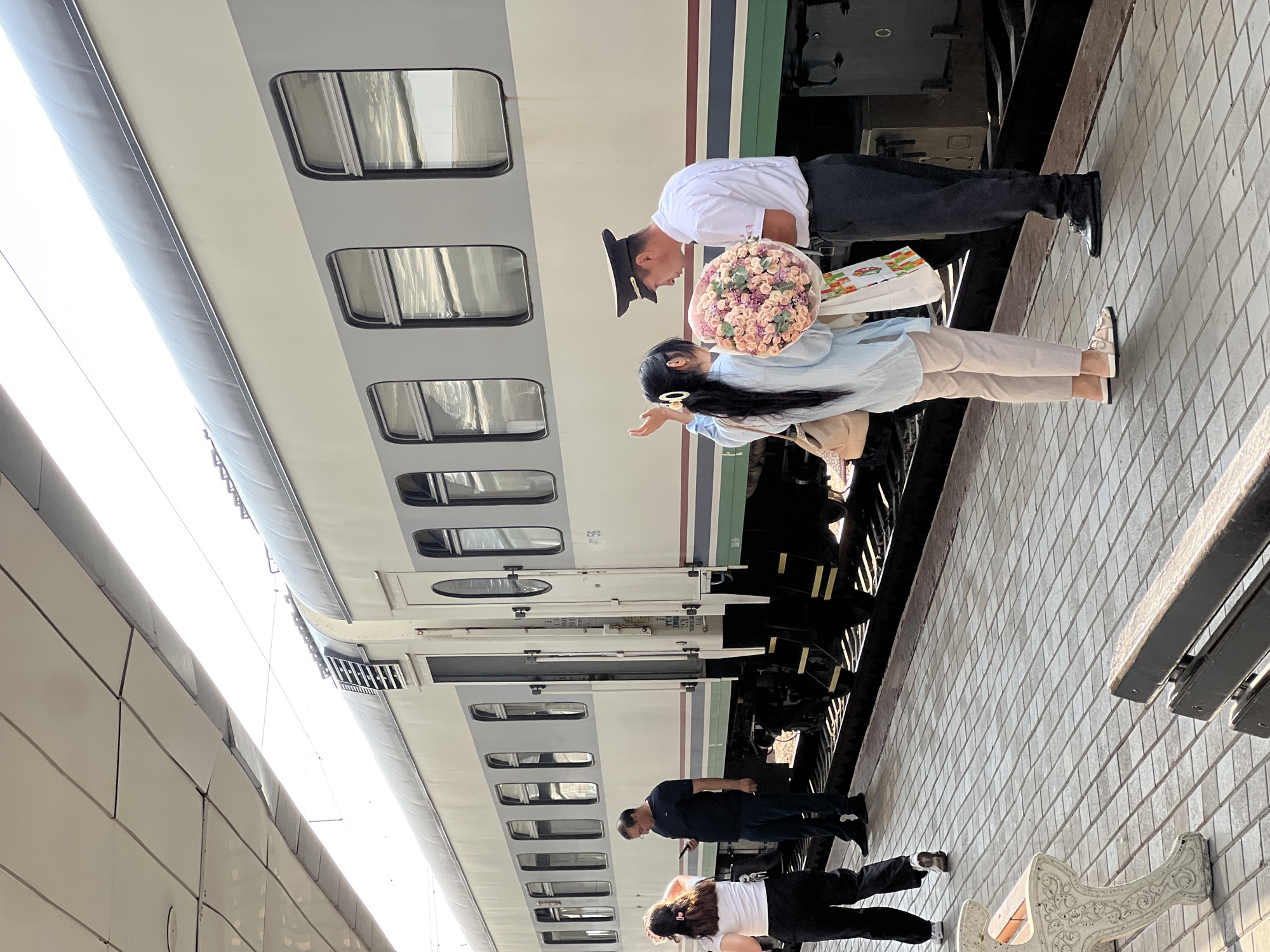 Busy departure scene at Tashkent's train station and airport