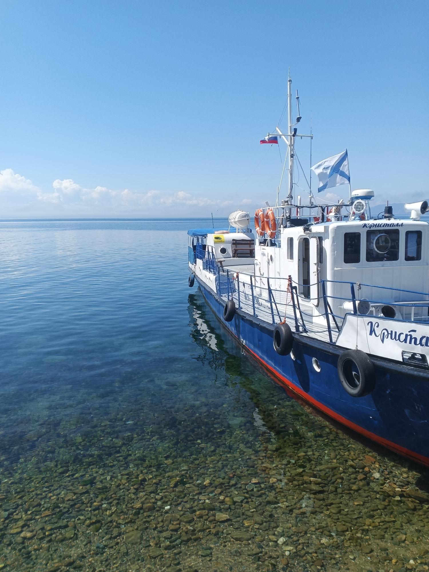 Sunny afternoon on Lake Baikal's Listvyanka waterfront promenade