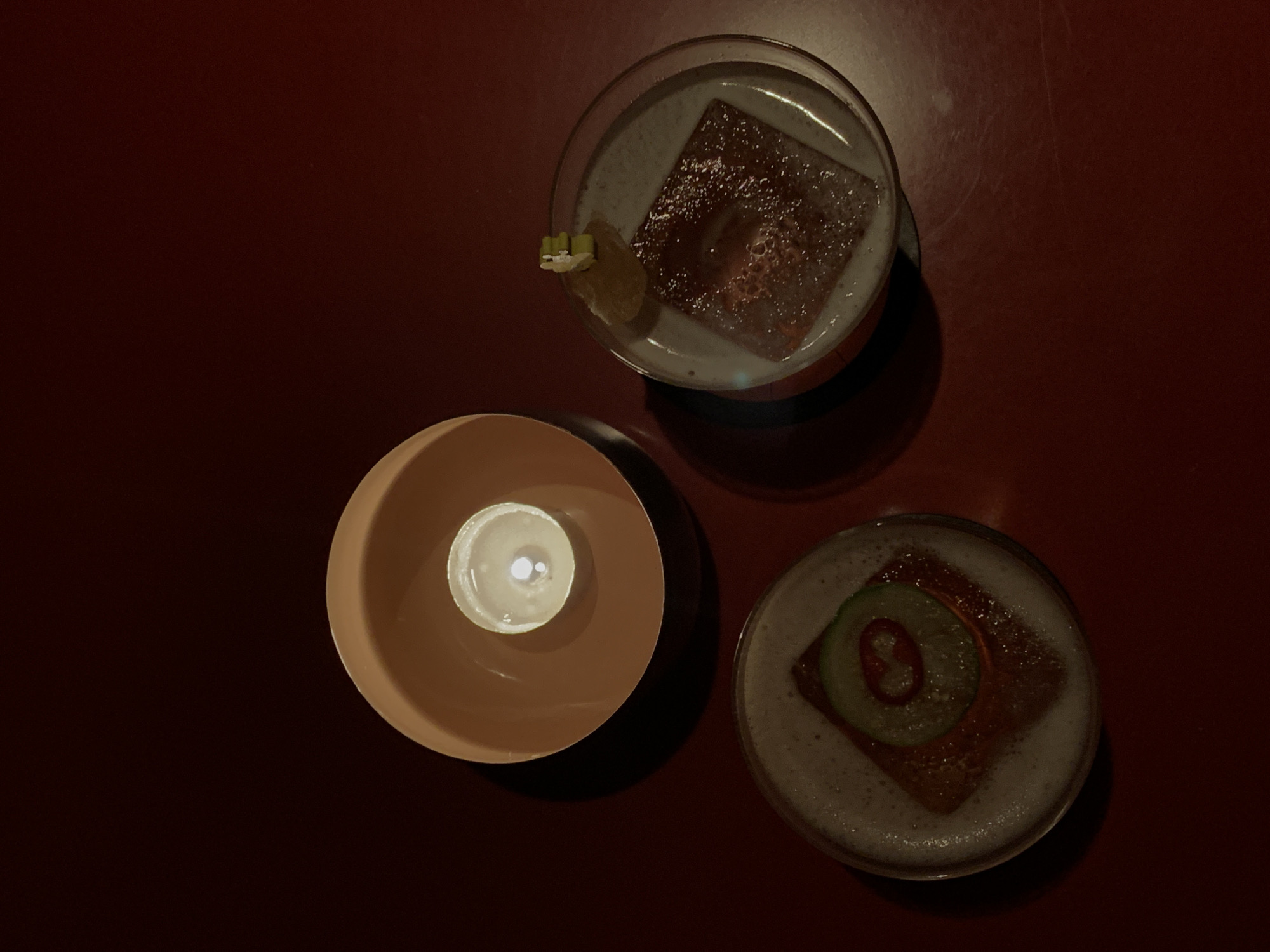 Evening documented at upscale London bar with cocktails, decor