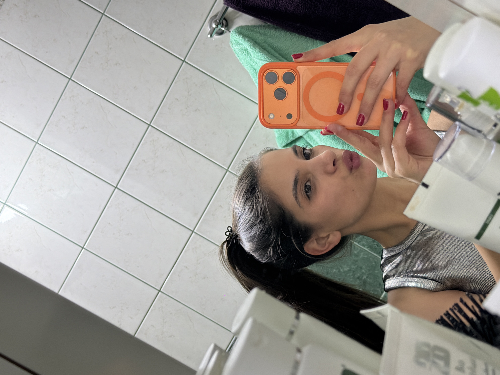 Woman takes bathroom selfie in Rudartsi, Bulgaria