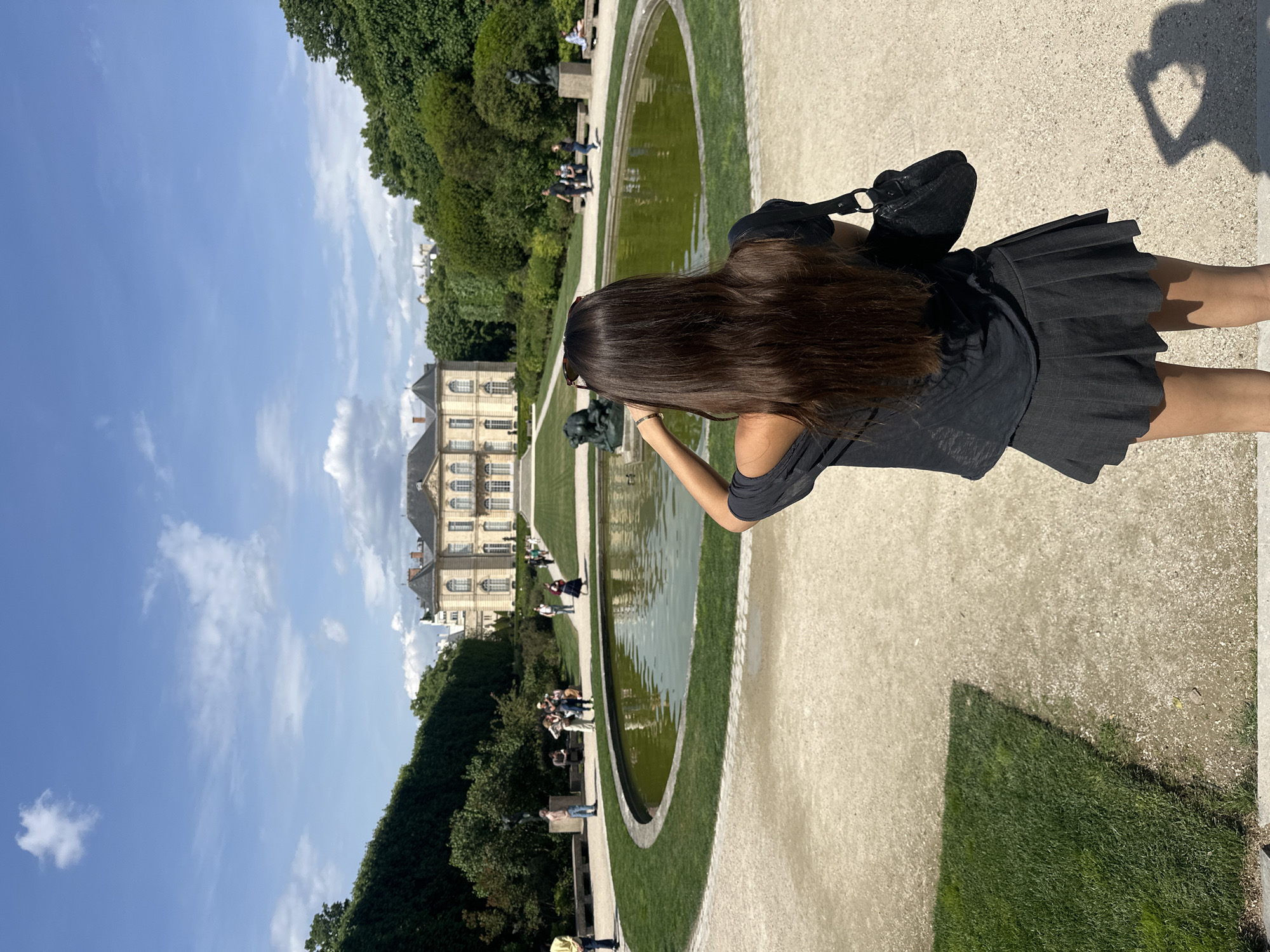 Tourists photograph sculptures, spot rabbits at Paris Rodin Museum gardens