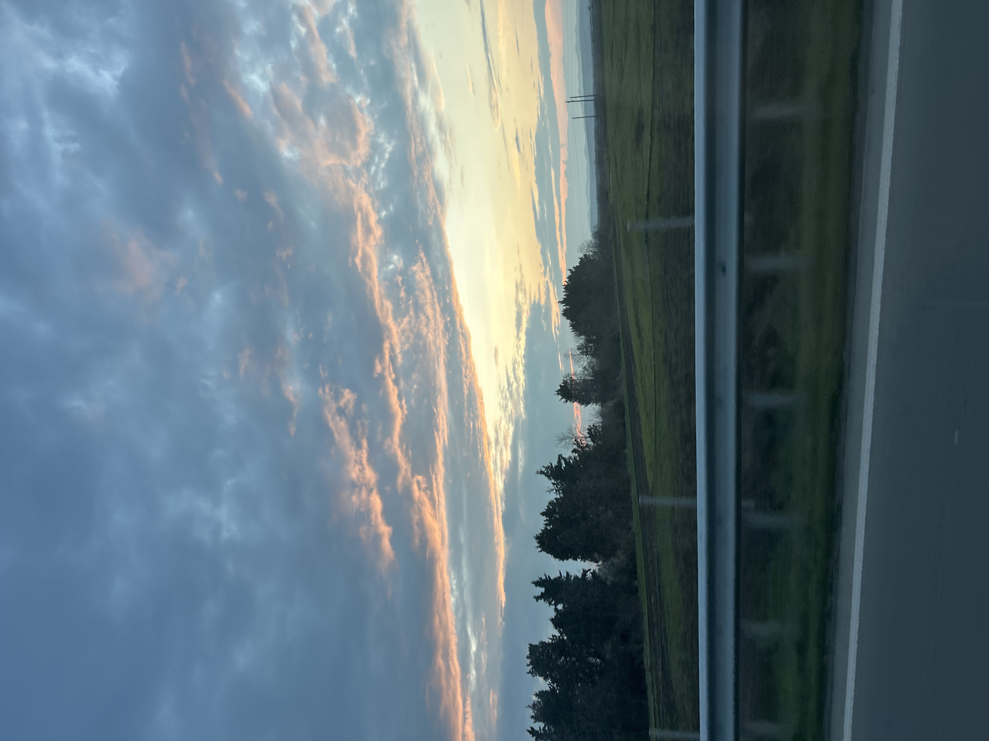 Vehicle passenger captures countryside landscape near Pomorie, Bulgaria