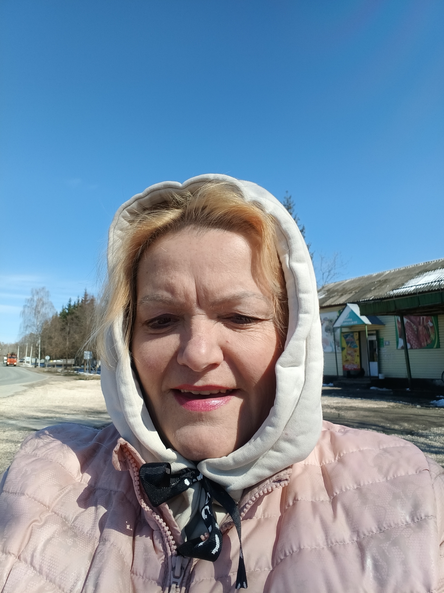 Woman and dogs spotted in spring park scene in Красный Маяк