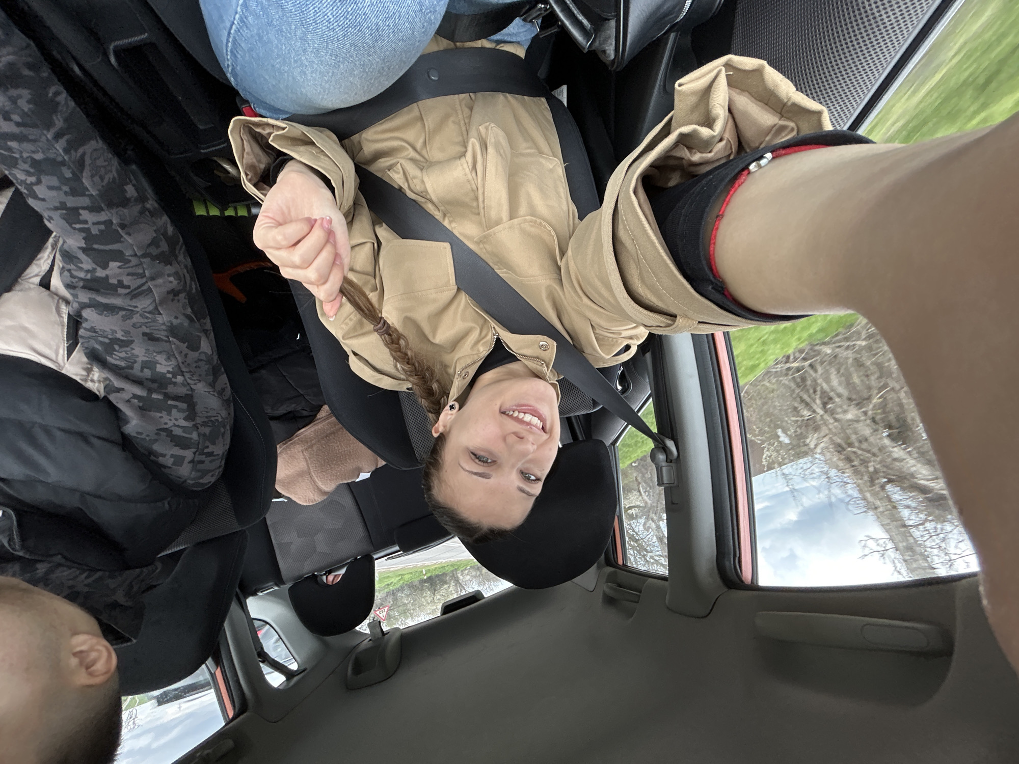 Woman takes selfie in car in Dve Mogili, Bulgaria