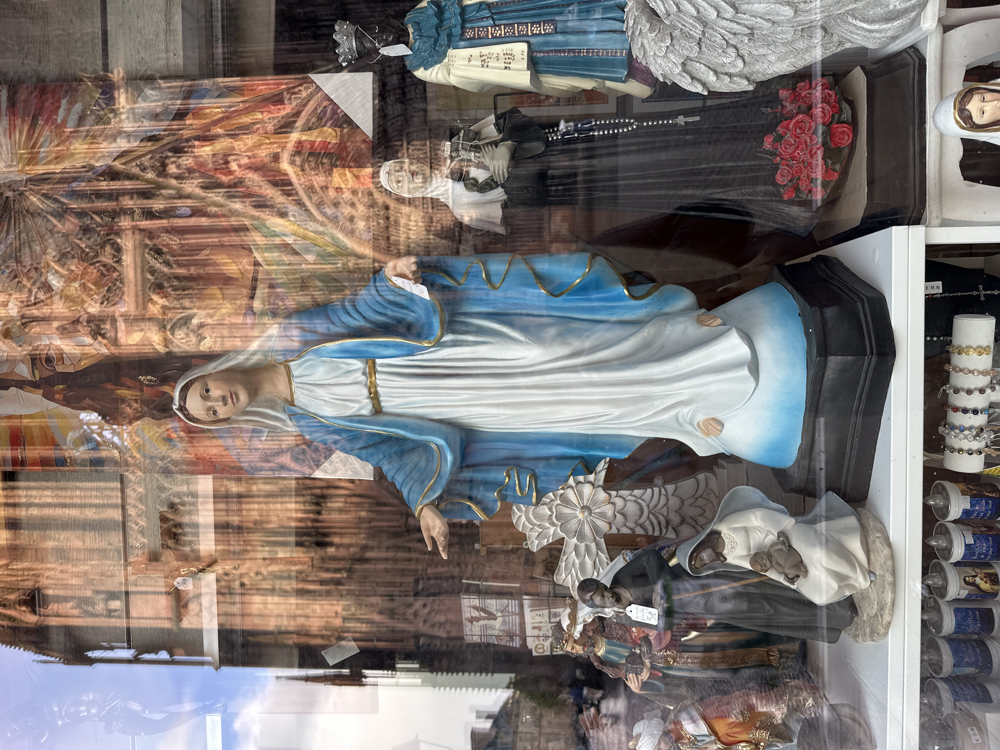 Tourist photographs Gothic Strasbourg Cathedral from multiple angles