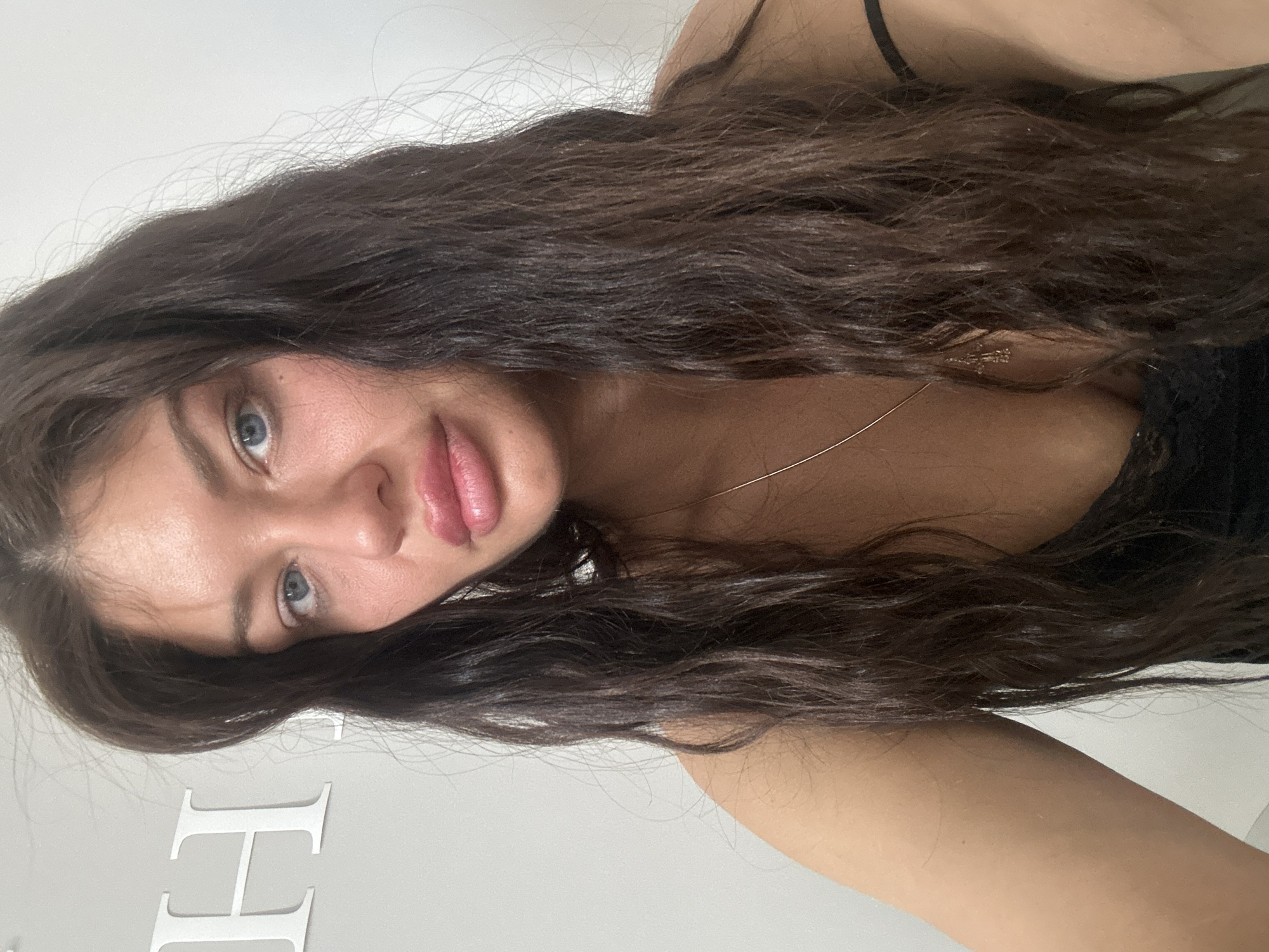 Woman photographed in Moscow apartment or indoor setting