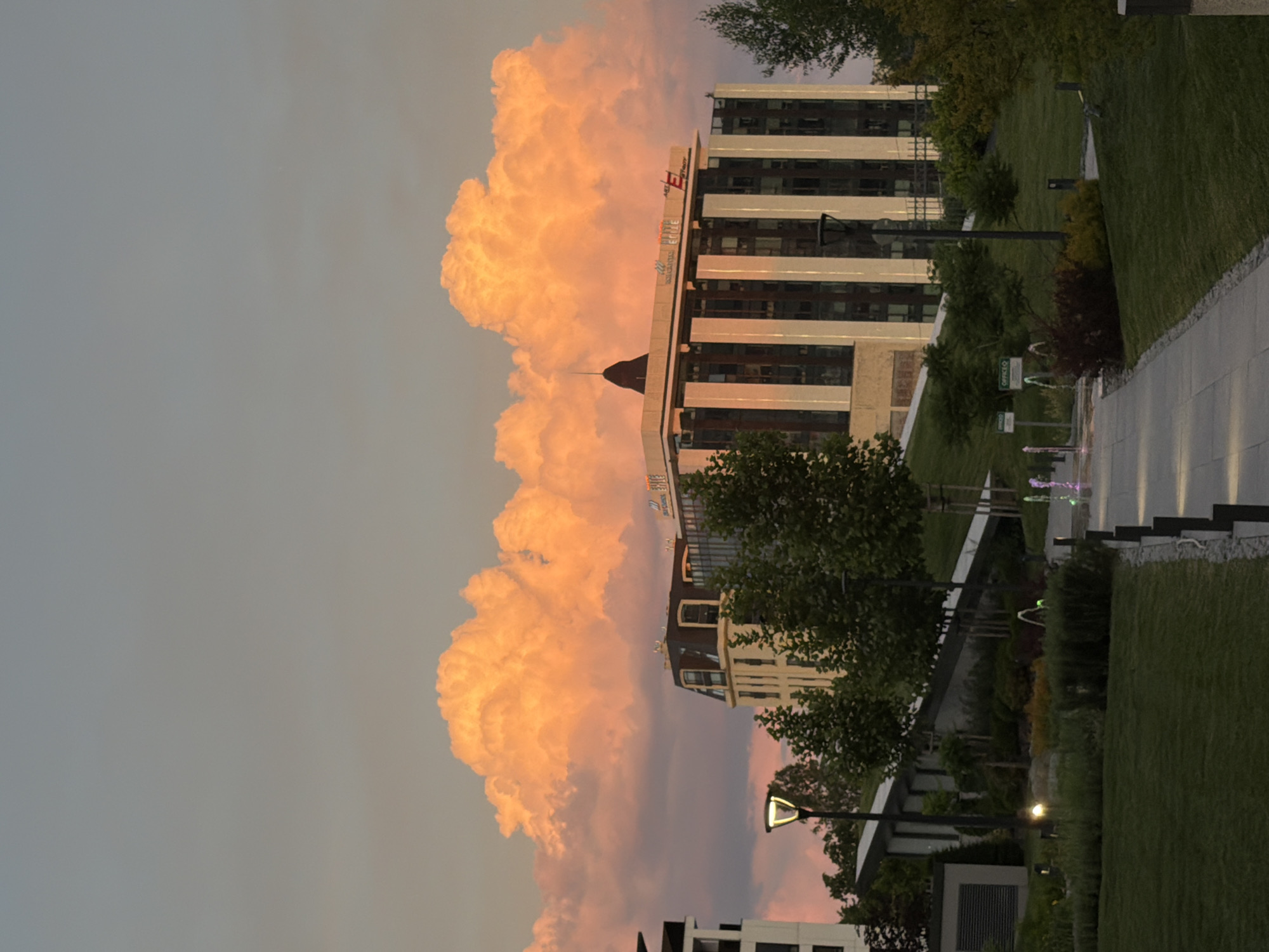 Dramatic sunset illuminates Sofia cityscape and commercial areas