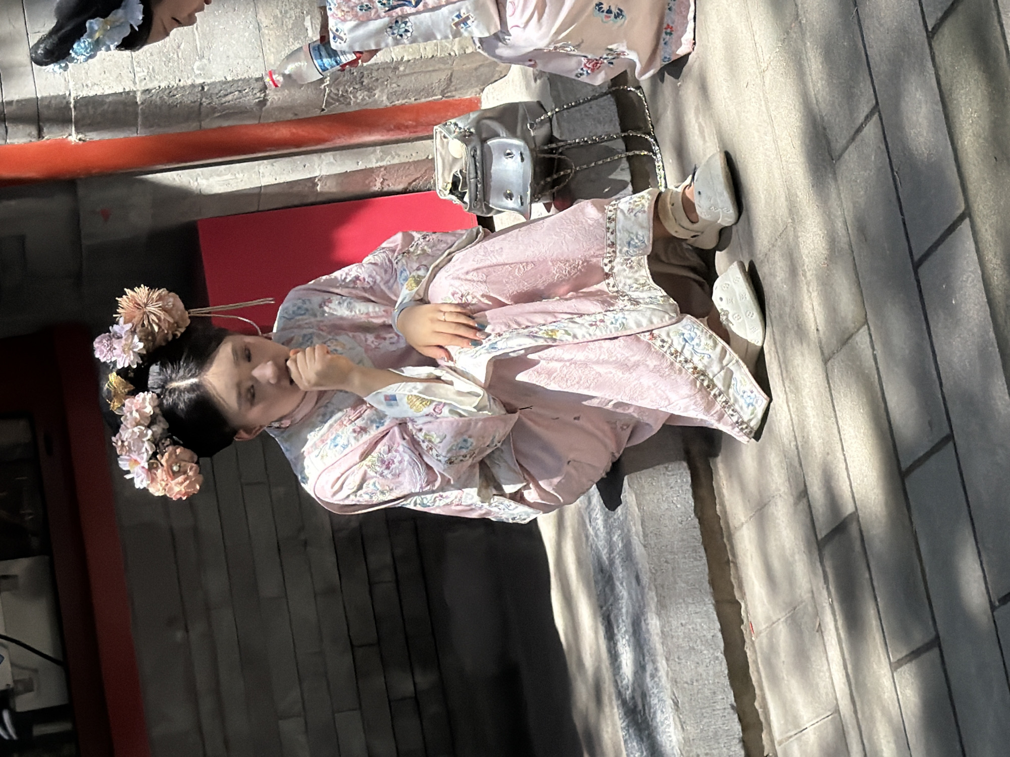 Hanfu, fish, and summer crowds along the Forbidden City moat