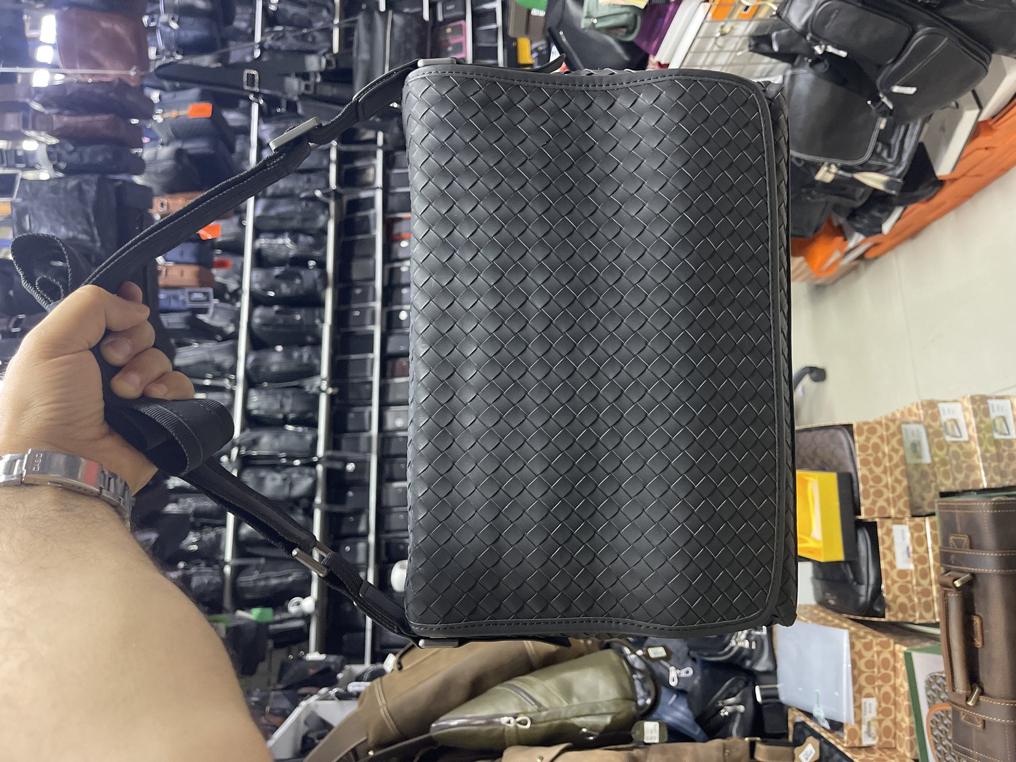 Browsing handbags at a Moscow retail store