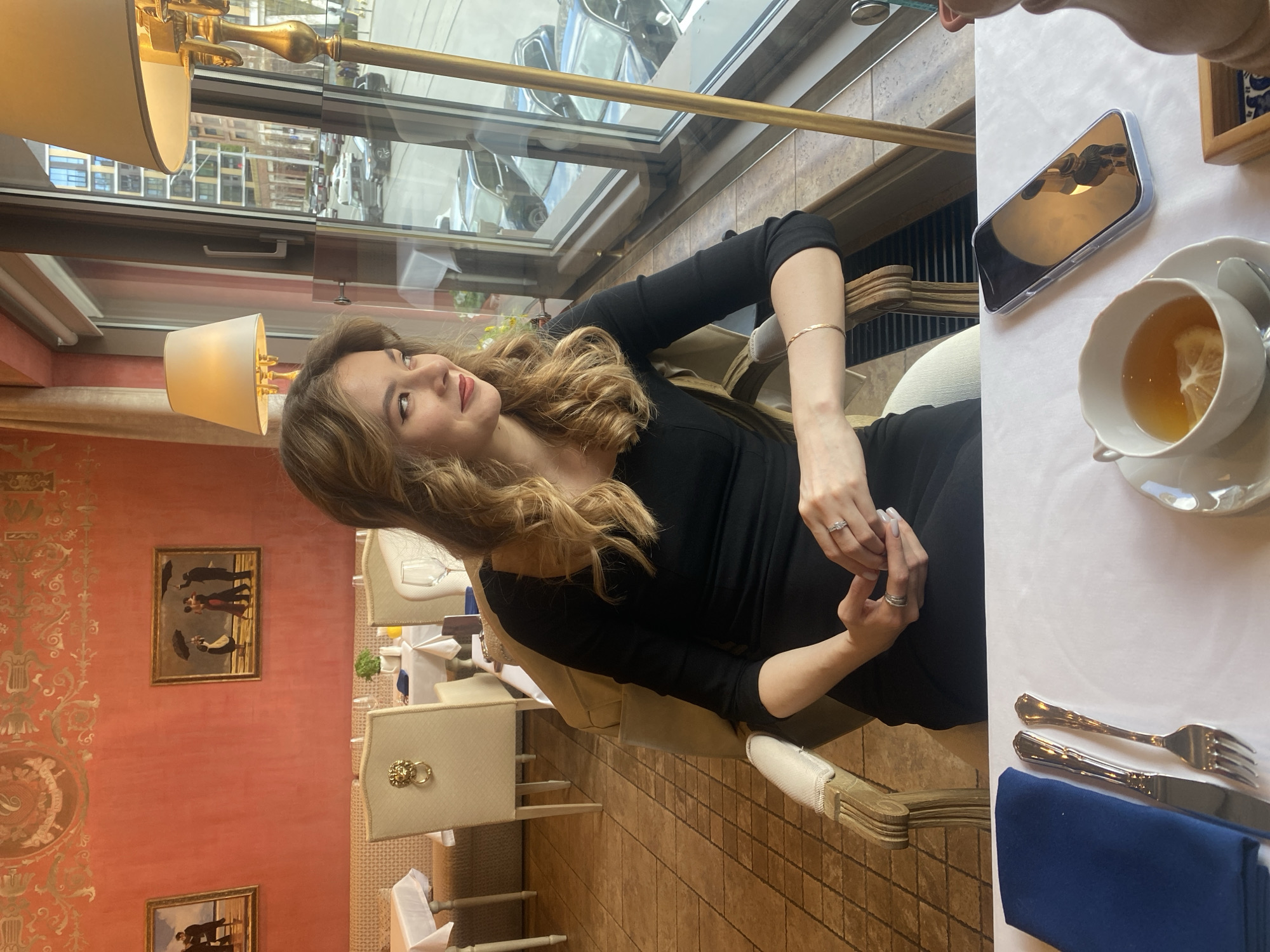 Woman dines at upscale Yekaterinburg restaurant during morning hours