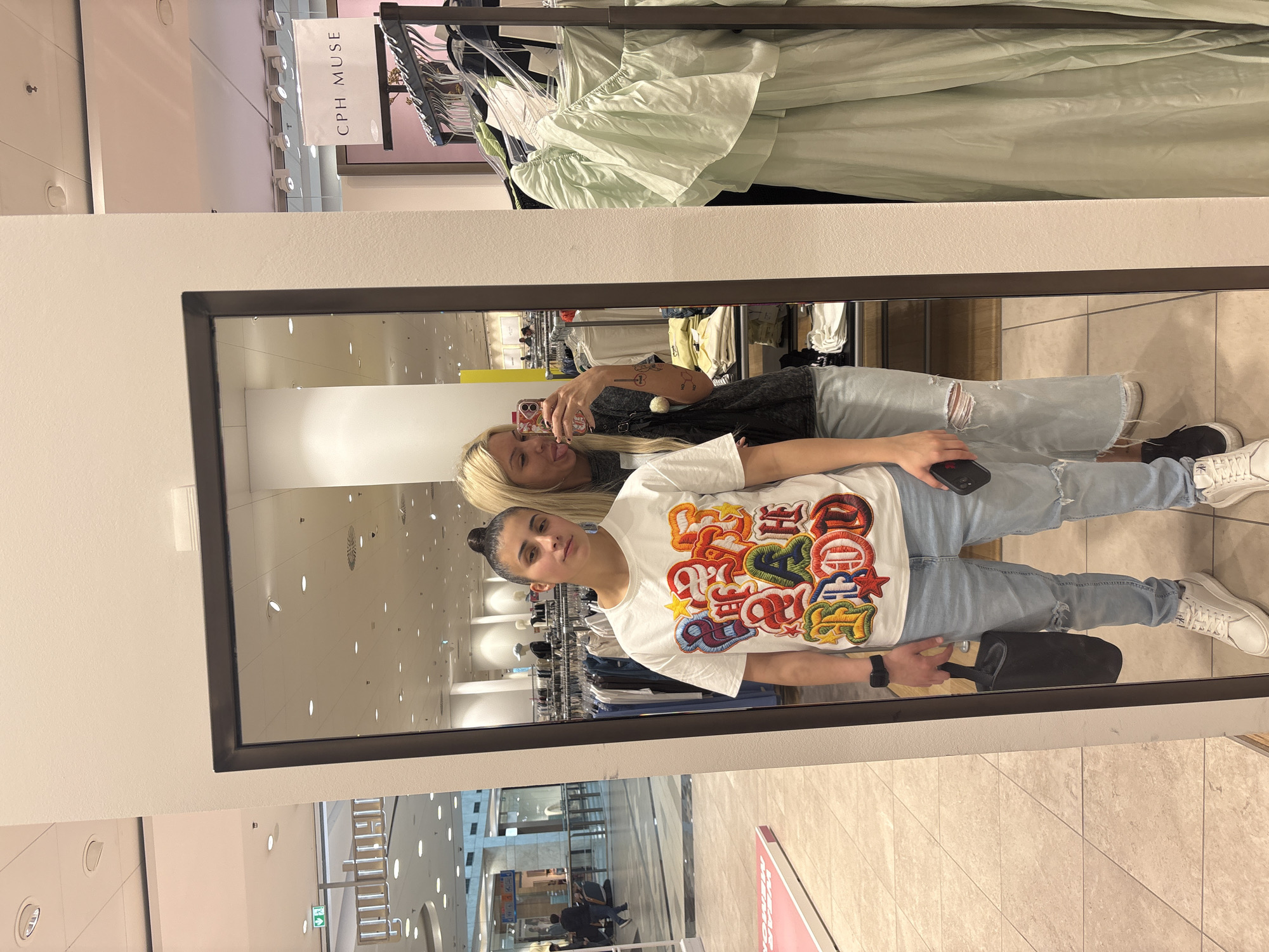 Women take mall selfie in Sofia during afternoon outing